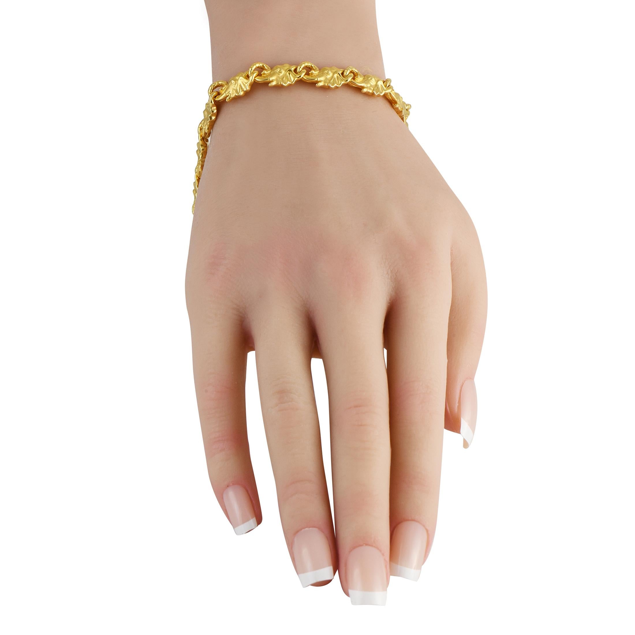 This Carrera Y Carrera bracelet pays tribute to one of the worlds most impressive animals. Crafted from lustrous 18K Yellow Gold, the links resemble stylized elephant heads with interlocking trunks. Sleek, stylish, and incredibly sophisticated, the