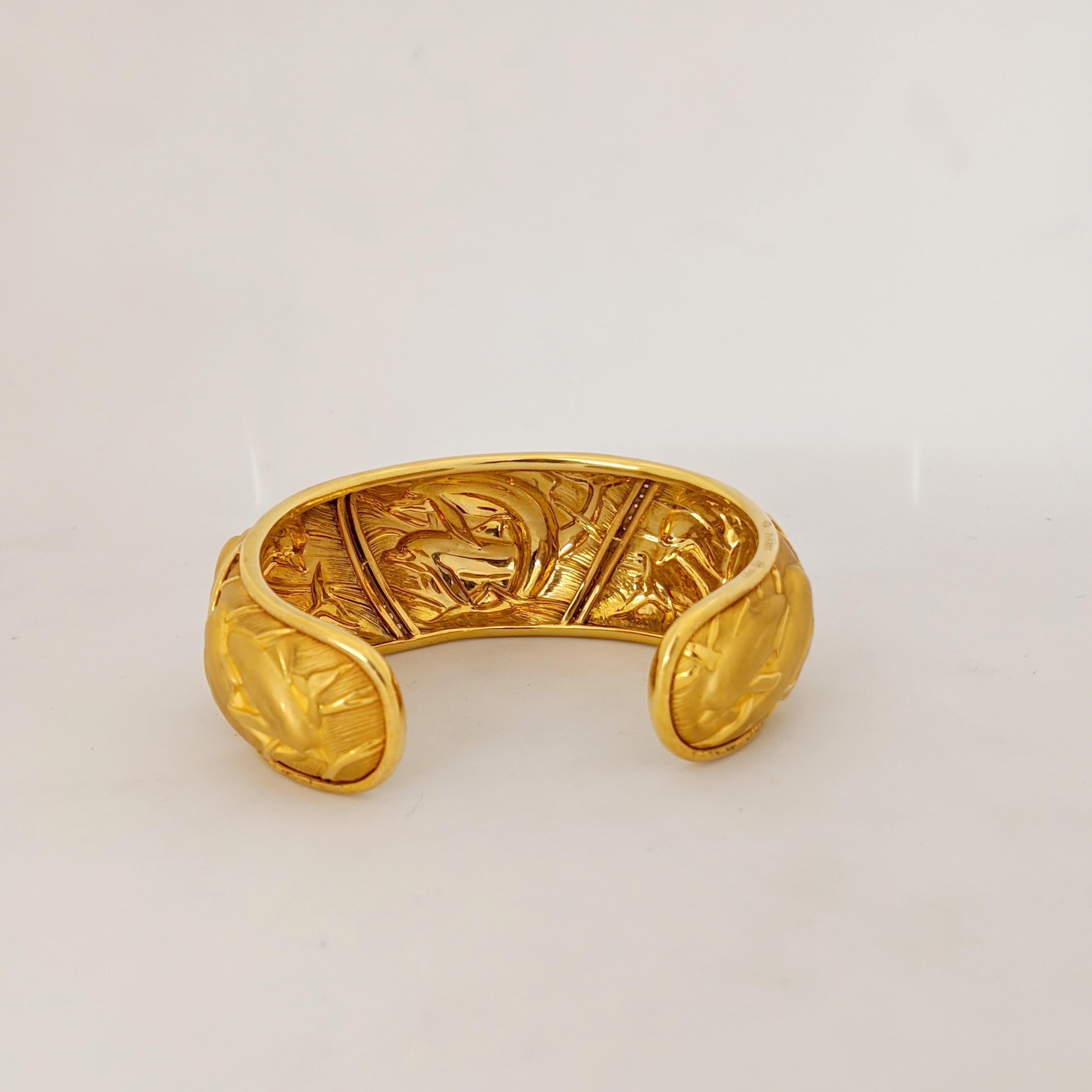 Carrera Y Carrera has built its its famous name on figurative designs, an obsession with surface finishes, and a compelling way of seeing beauty in art and nature.
This 18 karat yellow gold cuff bracelet from the Mosaico collection is the perfect
