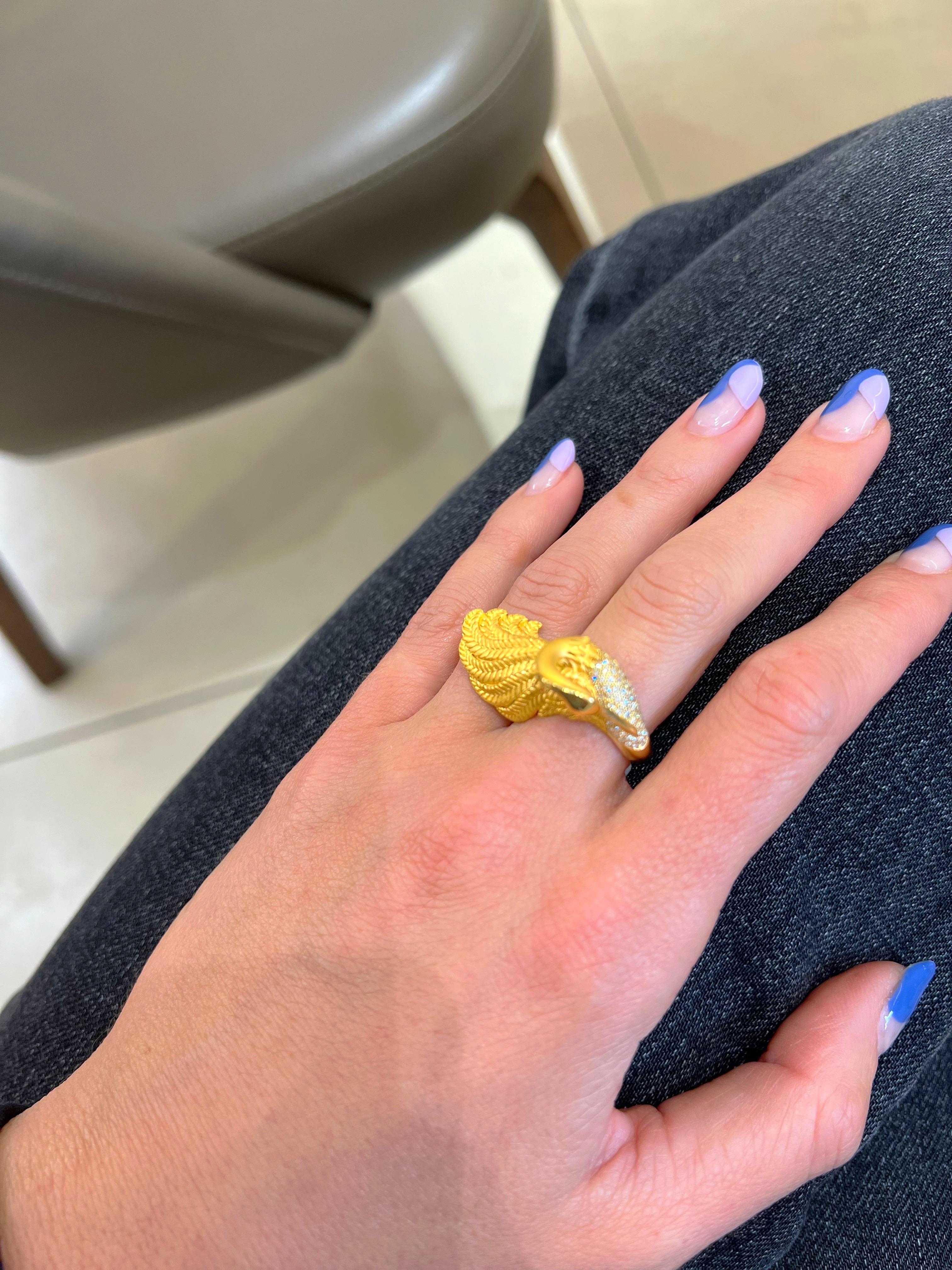 Carrera Y Carrera has built its famous name on figurative designs, an obsession with surface finishes, and a compelling way of seeing beauty in art and nature.
 This 18 karat yellow gold ring is a perfect example of Carrera's iconic designs.