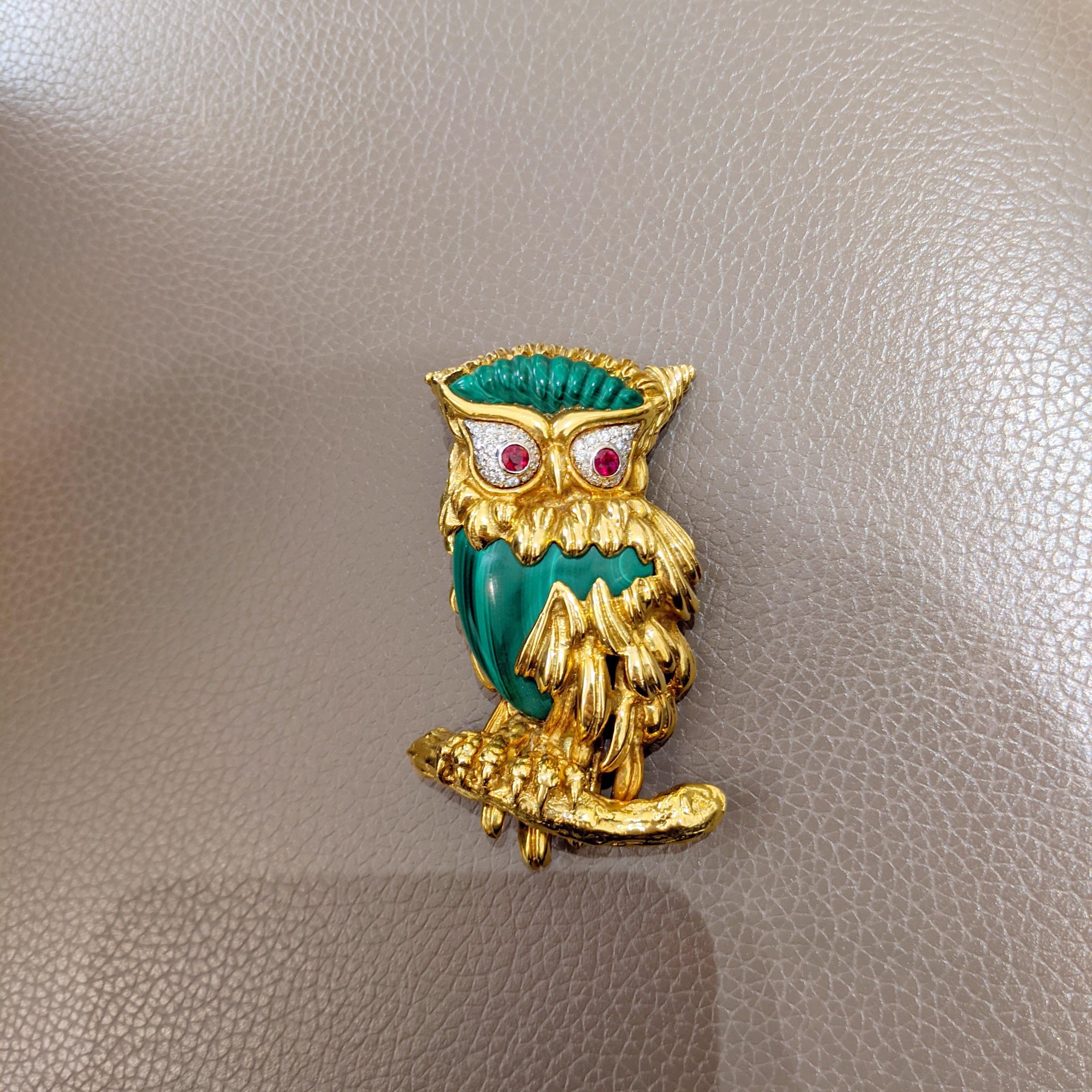 This unique owl brooch is designed by Carrera y Carrera  of Spain. In mythology owls relate to wisdom and femininity. This spectacular brooch is sculpturally  designed with a malachite body, 18 karat yellow gold for the feathers and pave diamond and