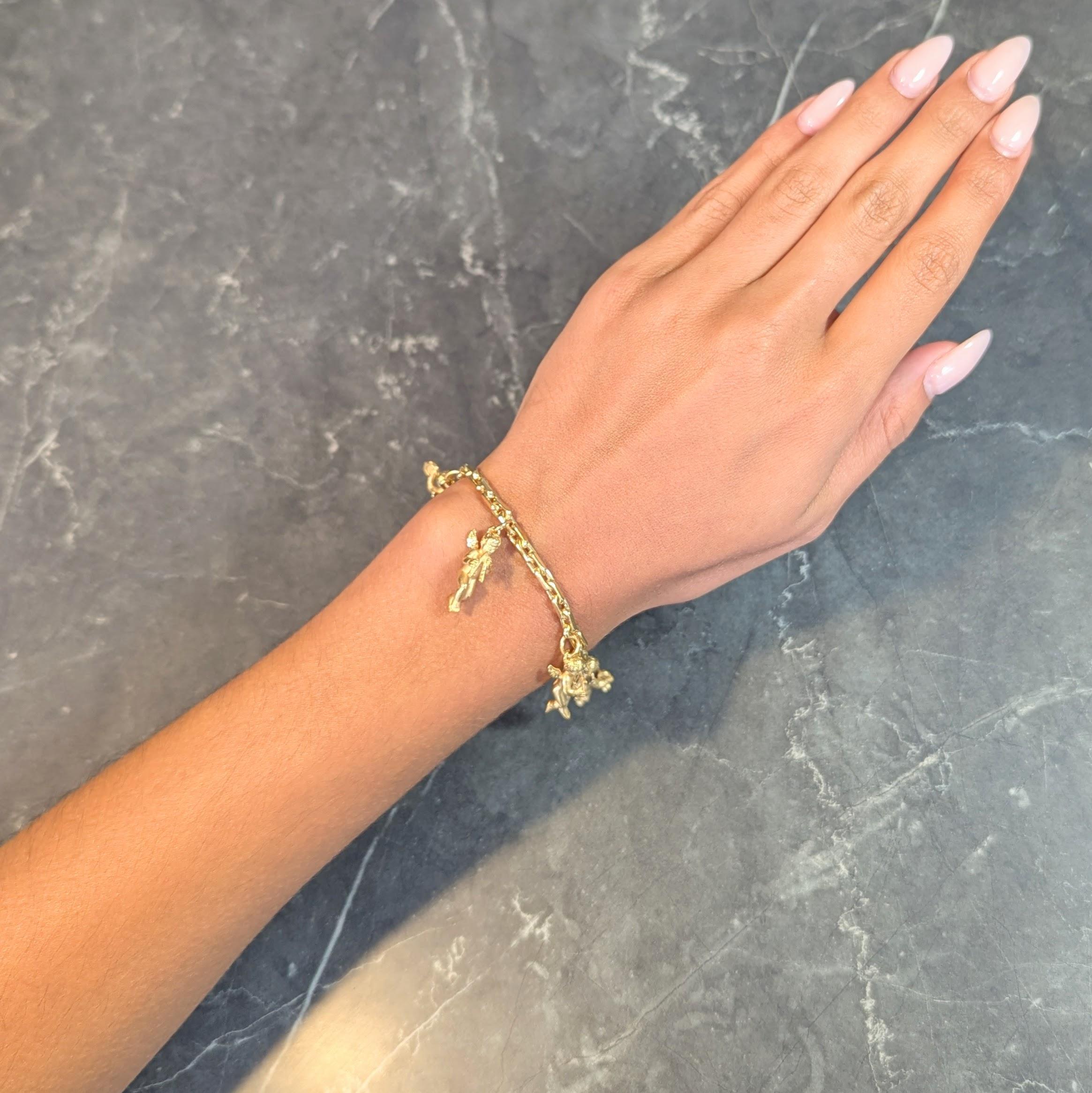 Carrera Y Carrera 1990's 18 Karat Yellow Gold Vintage Cherub Charm Bracelet In Excellent Condition In Philadelphia, PA