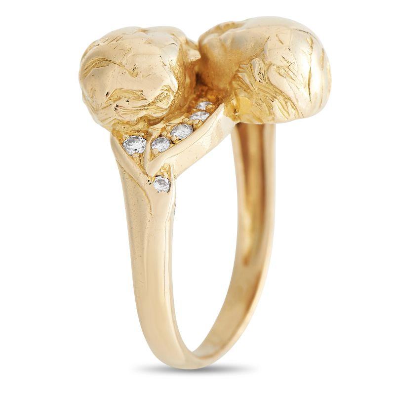 A pair of cherub motifs sit at the center of this impeccably crafted Carrera ring. On the sides, inset diamonds add extra sparkle to the charming design. This piece’s 18K Yellow Gold setting features a 2mm wide band and a 6mm top height, making it a