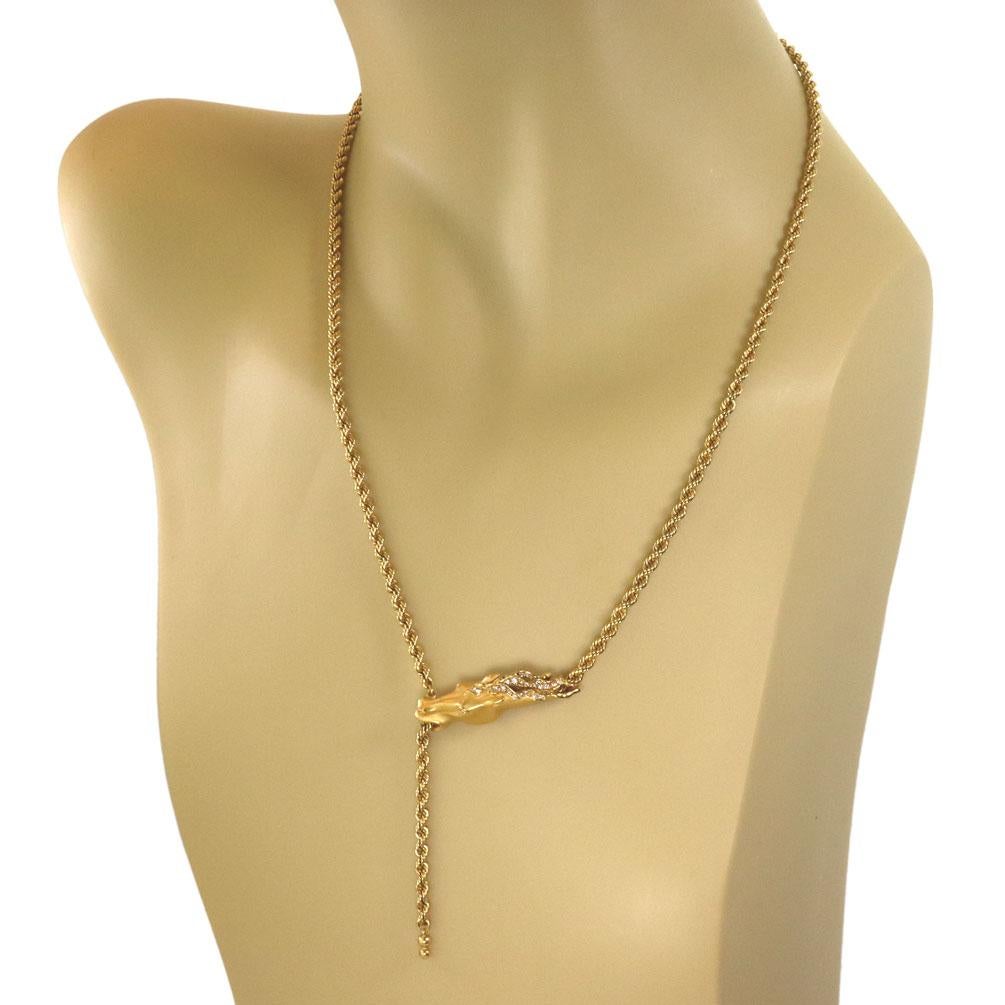 This eye catching authentic necklace is by Carrera y Carrera, it is crafted from 18k yellow gold with a polished finish featuring a horse head with the rope chain flowing through it mouth and a small length dangling below.  The flowing mane of the