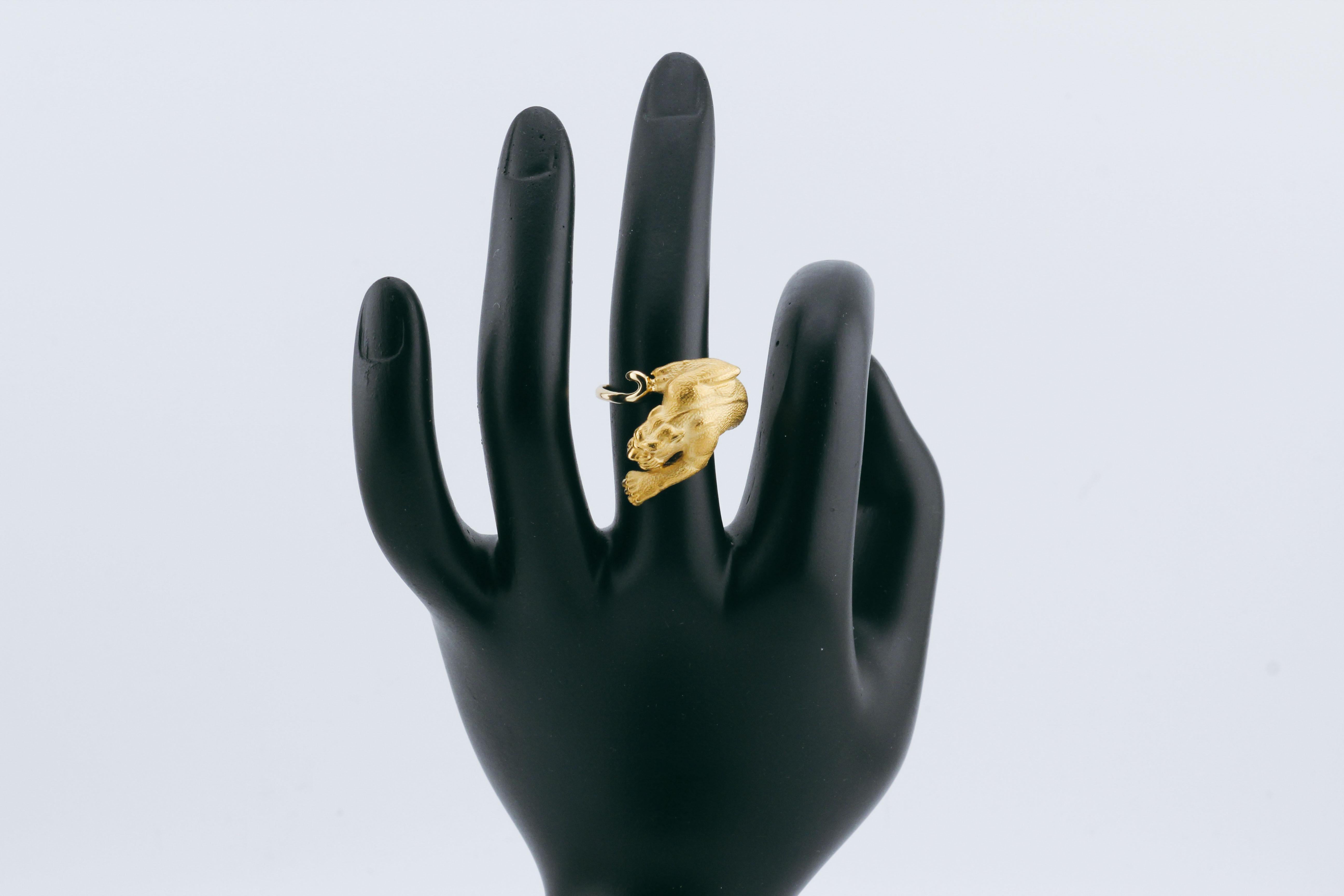The Carrera y Carrera Diamond 18K Yellow Gold Panther Ring is an exquisite example of the brand’s renowned artistry, merging bold design with intricate craftsmanship. This striking piece features a powerful panther motif, meticulously sculpted from