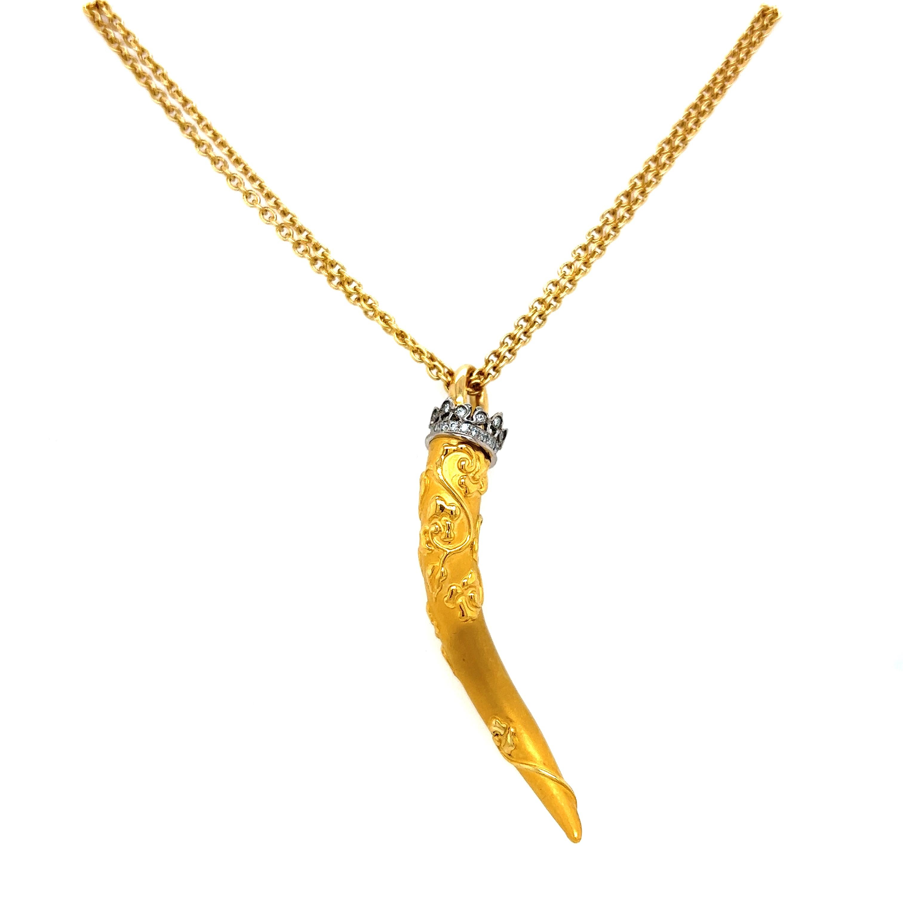    One of a kind design from famed designer Carrera y Carrera. The necklace is crafted in the form of a large decorative cornicello Italian horn. 
   Known for their detailed finishing this pendant necklace is no different the horn is crafted in