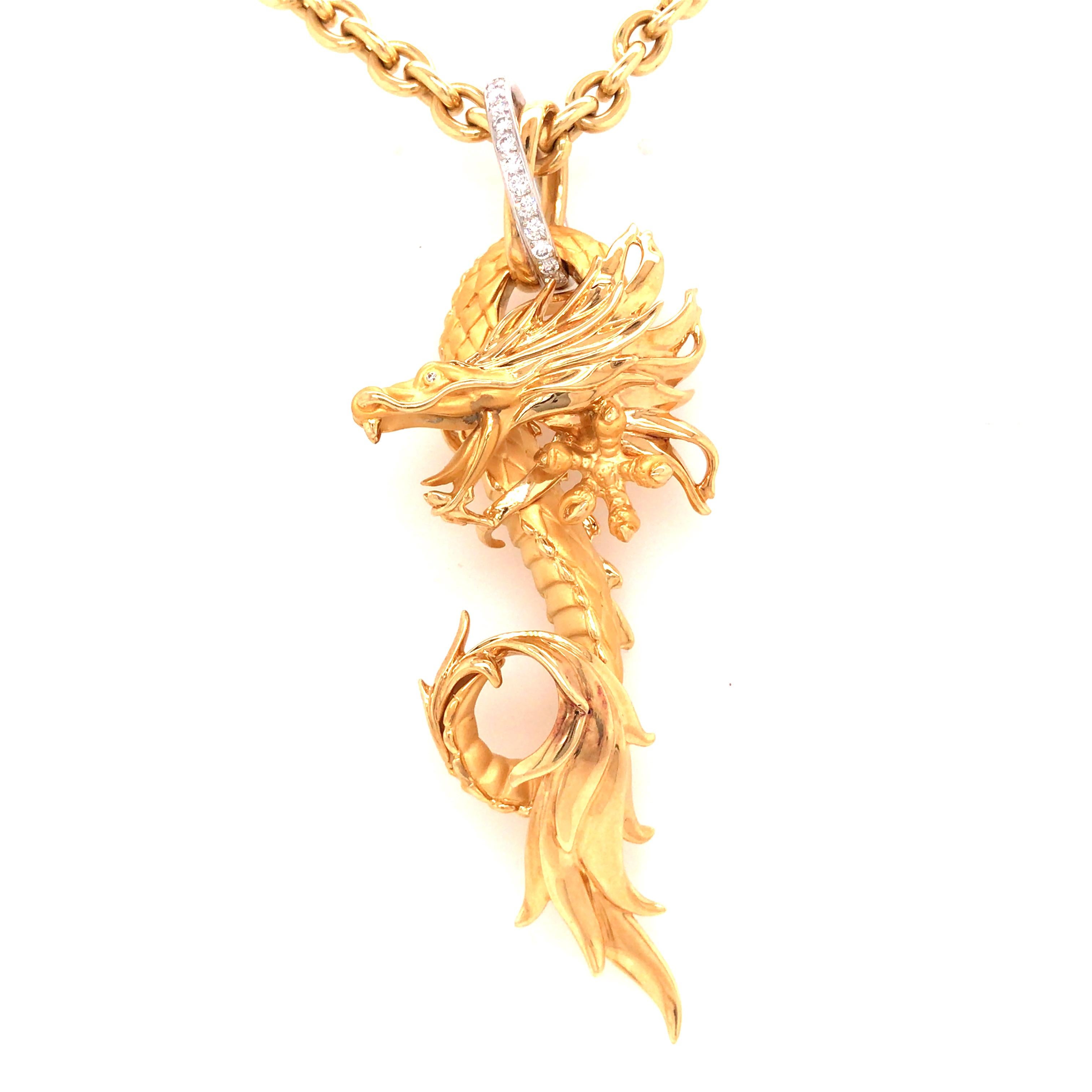 Carrera Y Carrera Dragon Pendant Necklace in 18K Two-Tone Gold.  Round Brilliant Cut Diamonds weighing 0.45 carat total weight, G-H in color and VS in clarity are expertly set in the White Gold bale. The Dragon measures 3 1/2 inch in length and 1