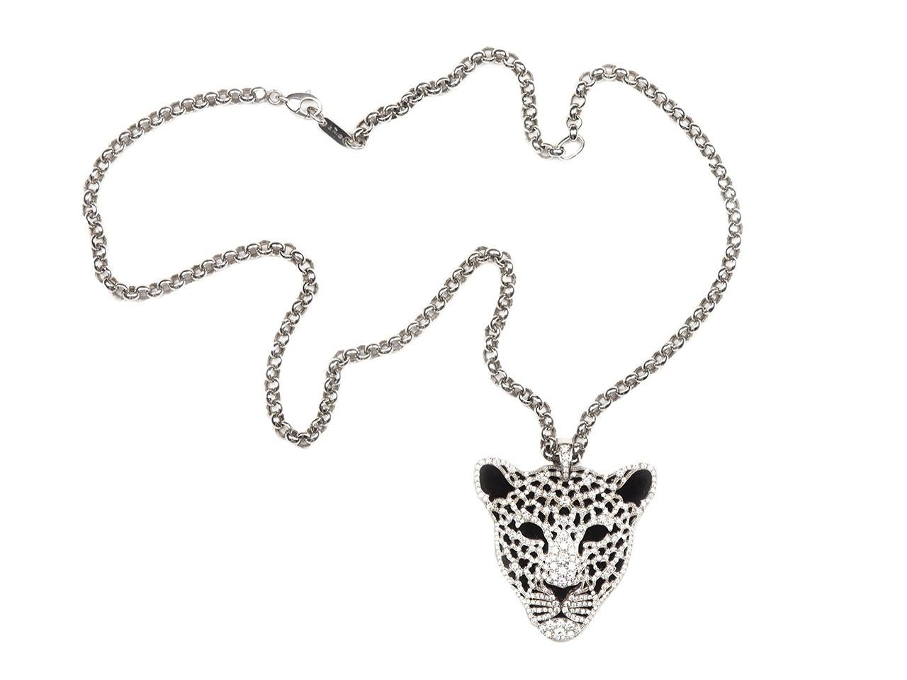 18k gold diamond and onyx leopard pendant necklace. Signed.