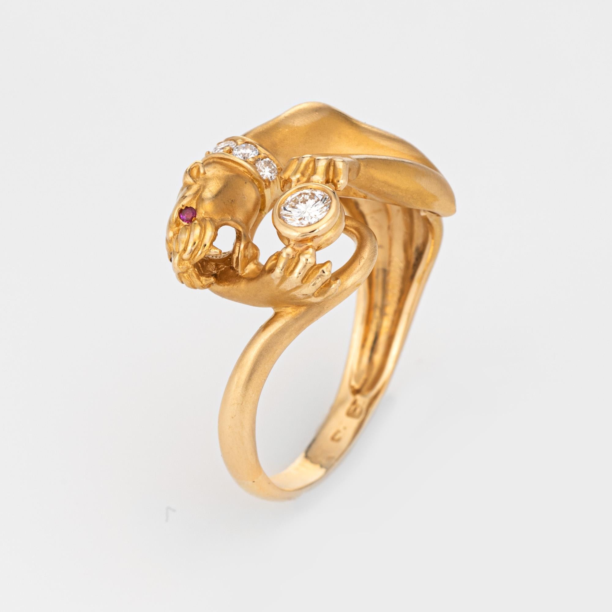 Stylish estate Carrera y Carrera diamond panther ring crafted in 18k yellow gold. 

One diamond is estimated at 0.15 carats, accented four diamonds estimated 0.02 carat diamonds. The total diamond weight is estimated at 0.23 carats (estimated at G-H