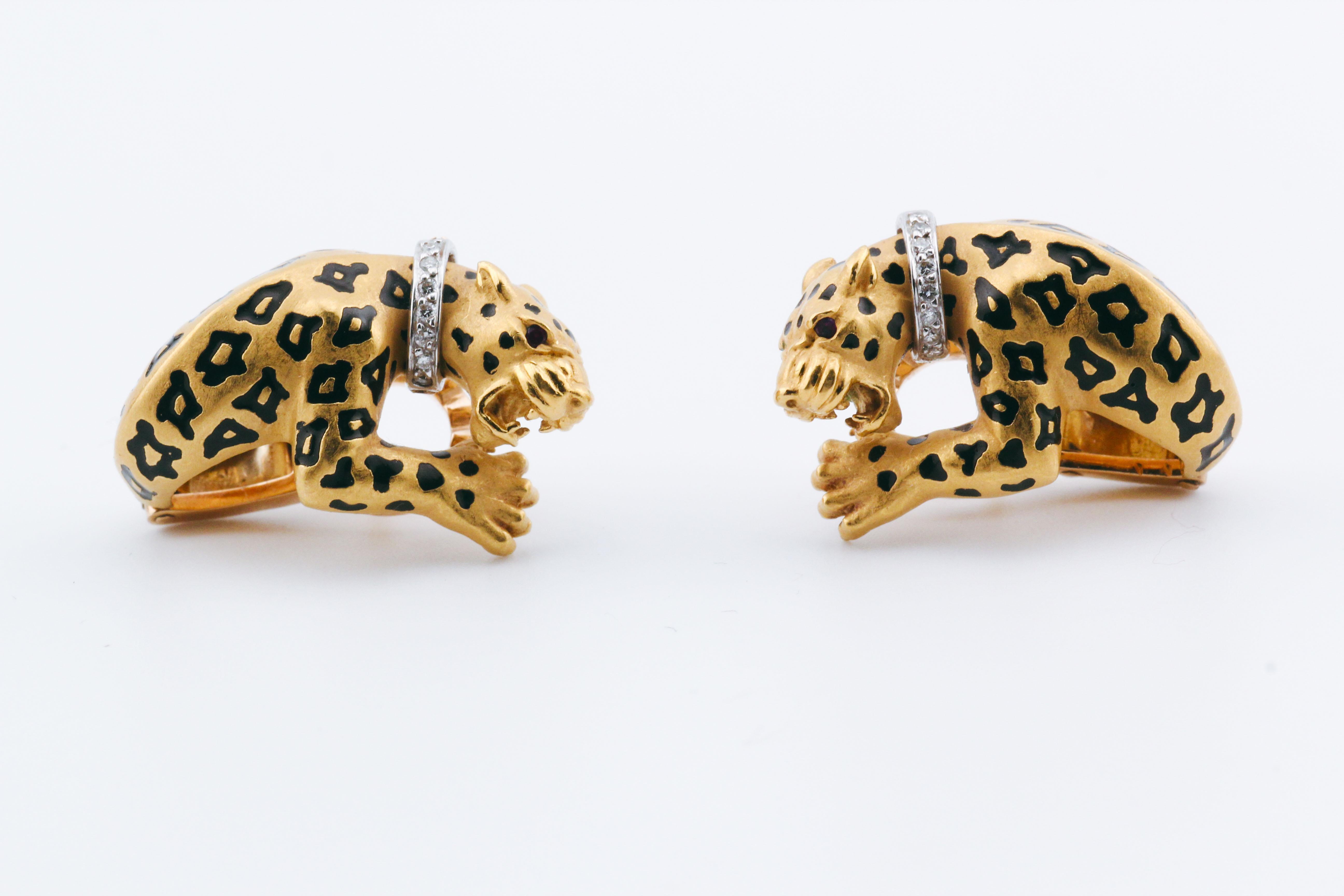 The Carrera Y Carrera Diamond Ruby Enamel 18K Yellow Gold Panther Earrings are an exquisite blend of luxury and artistry, capturing the fierce elegance of the majestic panther. 

Crafted from rich 18K yellow gold, these earrings feature panthers
