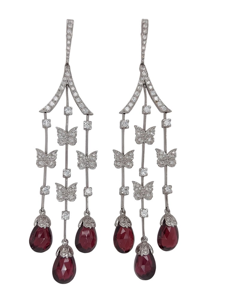 These Exquisite and dangling are crafted by Carrera Y Carrera Earrings from Butterfly Collection in 18kt White Gold with Diamonds & Rubellites 

Can also be bought with a gorgeous matching pendant drop necklace as seen on the photographs.

Material: