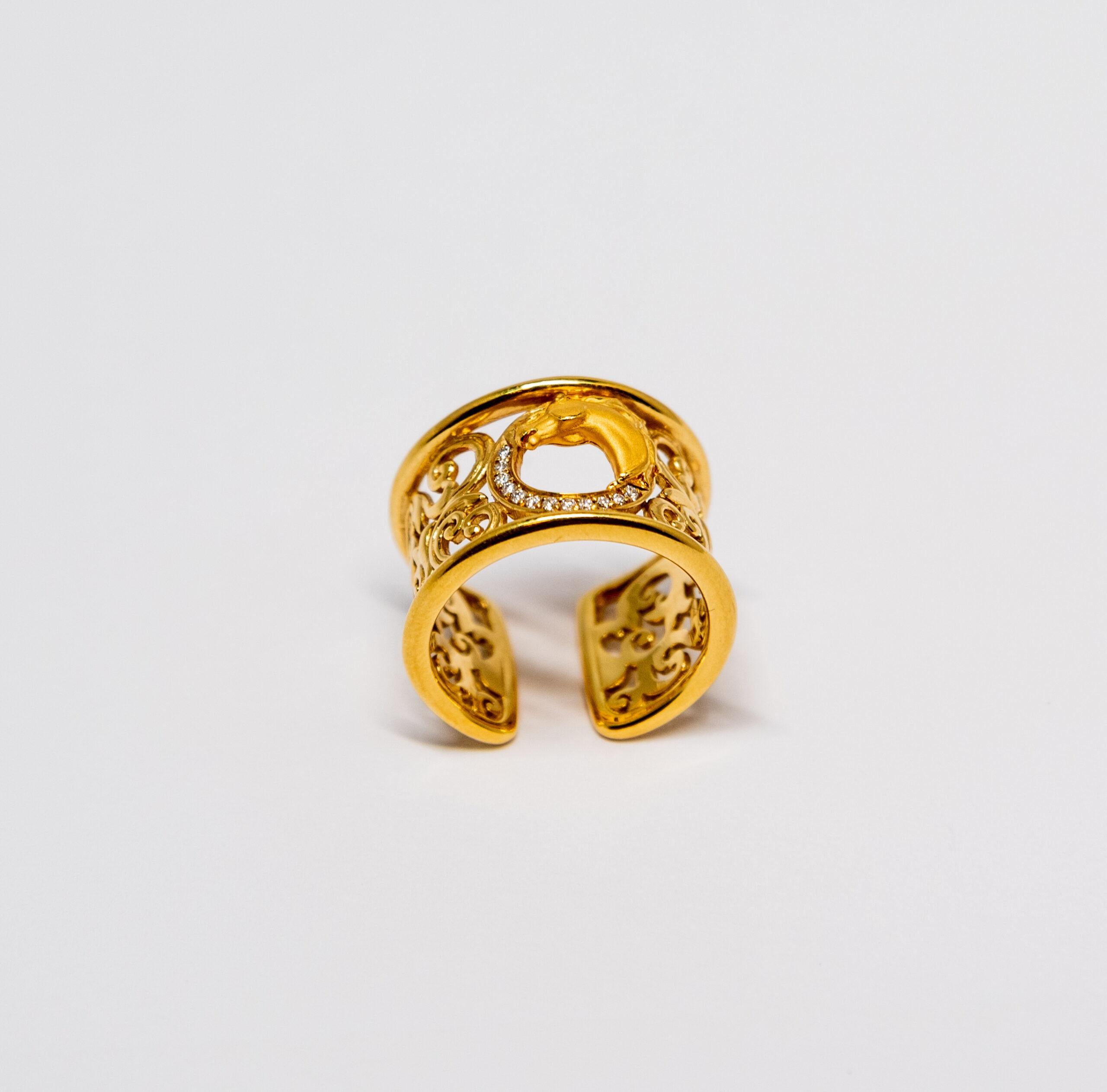 This ring is made of 18K Yellow Gold. The handmade horse-shaped figure in the middle with 12 diamonds.

The Size – 53.5 (6.5 US)