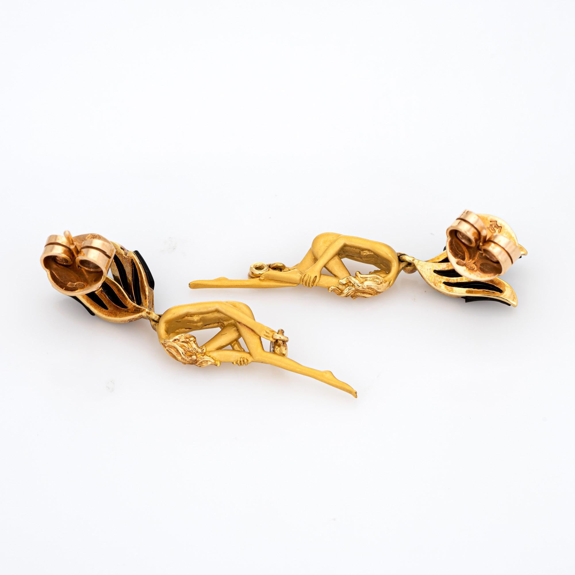 Elegant pair of pre-owned Carrera y Carrera winged fairy earrings crafted in 18k yellow gold. 

Four diamonds total an estimated 0.06 carats (estimated at G-H color and VVS2 clarity).  

The charming earrings by Carrera y Carrera highlight the