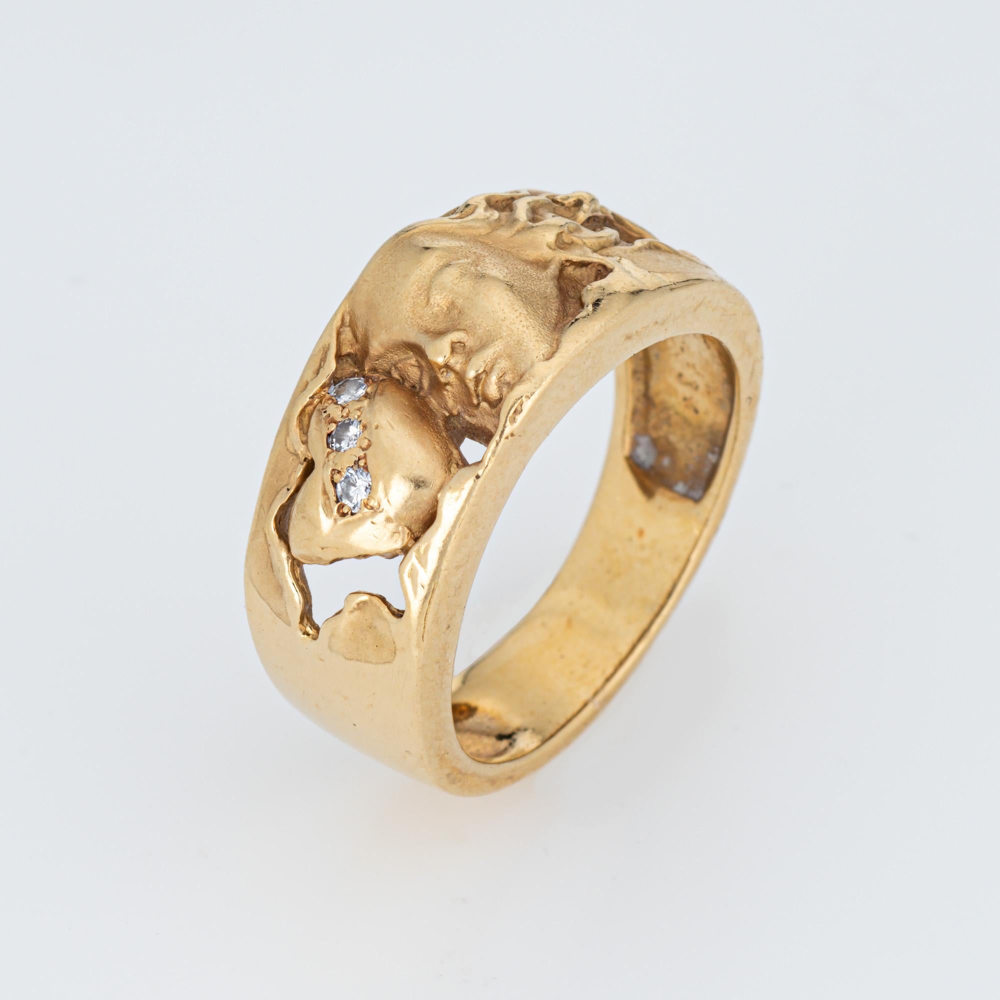 Vintage Carrera y Carrera diamond heart ring crafted in 18 karat yellow gold.  

Three diamonds total an estimated 0.03 carats (estimated at H-I color and VS2 clarity). 
The beautifully detailed band features the face of a woman with flowing locks