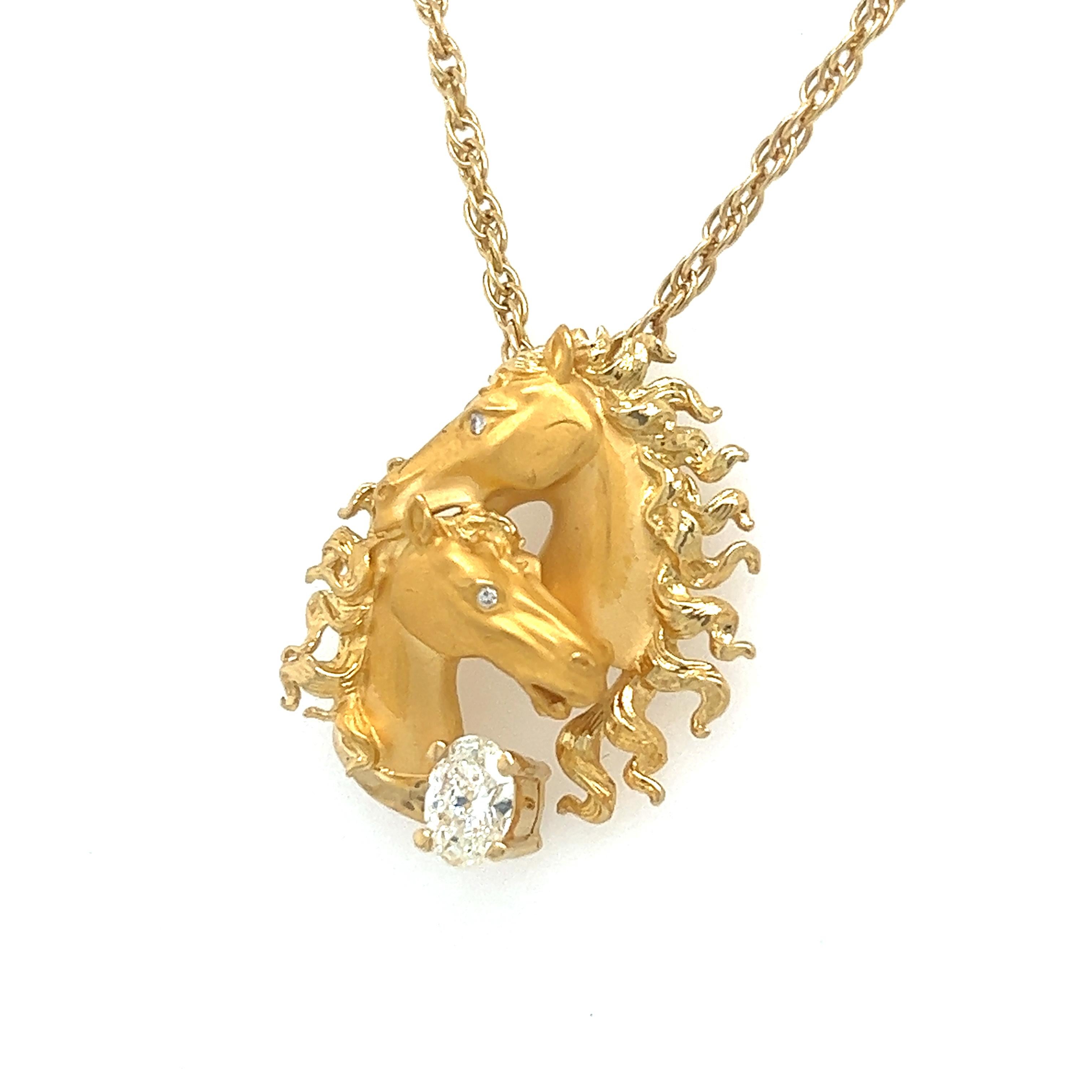 Beautiful creation from famed designer Carrera Y Carrera. Crafted in 18k yellow gold this horse themed diamond pendant is more than a necklace it is a piece of art!
Details are endless as both satin and high polish techniques are seen to highlight