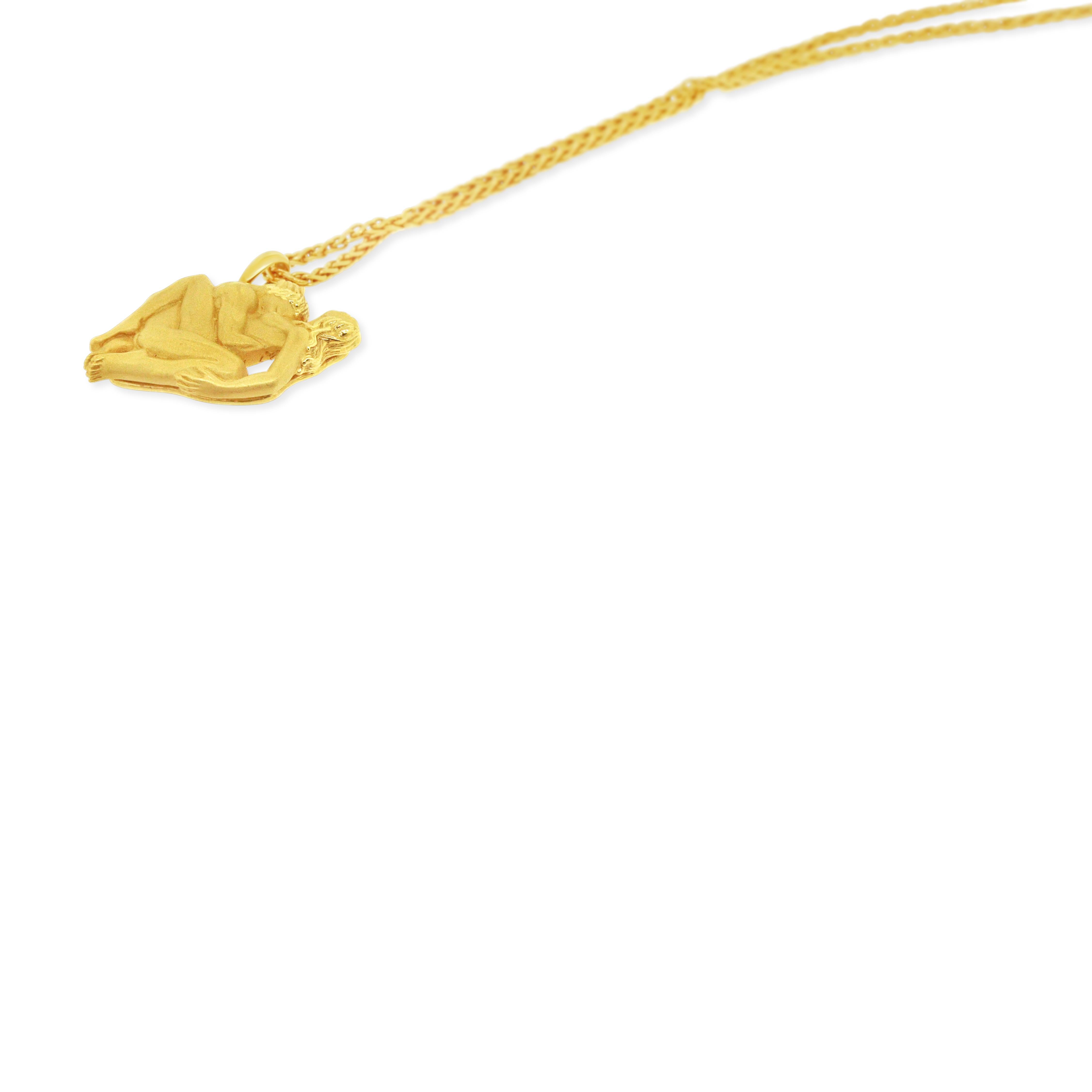 18 kt Yellow Gold
Width: 25.4 mm
Length: 22.86 mm
Chain Length: 19 inches
11.78 grams
Chain and Pendant all original Carrera y Carrera