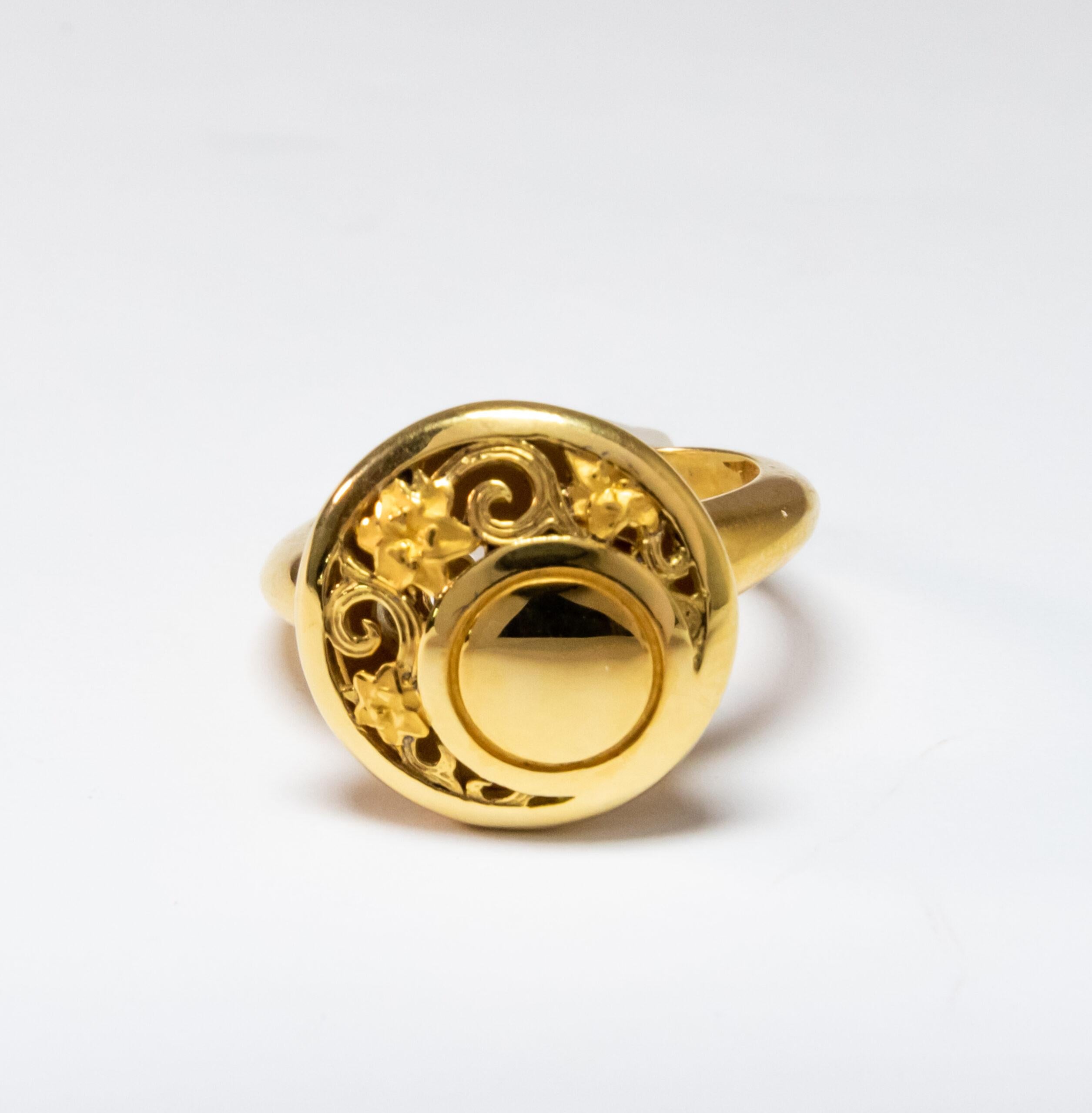This ring is made of 18K Yellow Gold. It is decorated with a floral pattern.

Size – 54 (6.75 US), 53 (6.25 US)