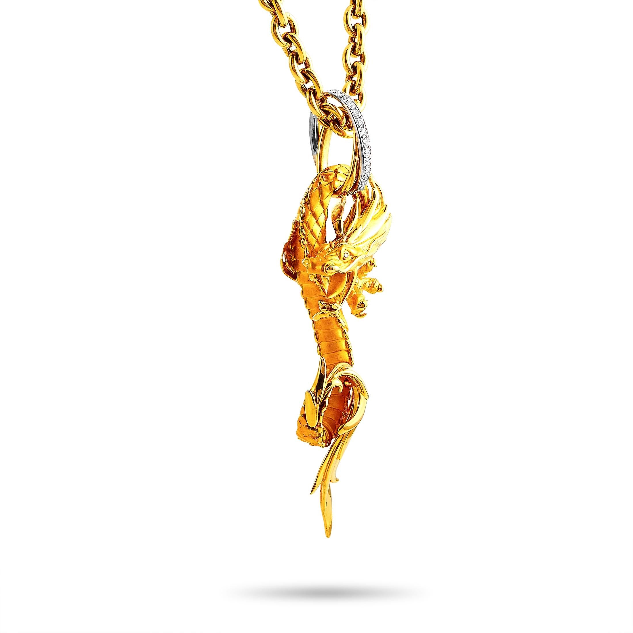 The Carrera y Carrera “Maxi Dragons” necklace is made out of 18K yellow and white gold and embellished with diamonds that total 0.40 carats. The necklace weighs 80.9 grams and is presented with a 30” chain and a pendant that measures 3.50” in length
