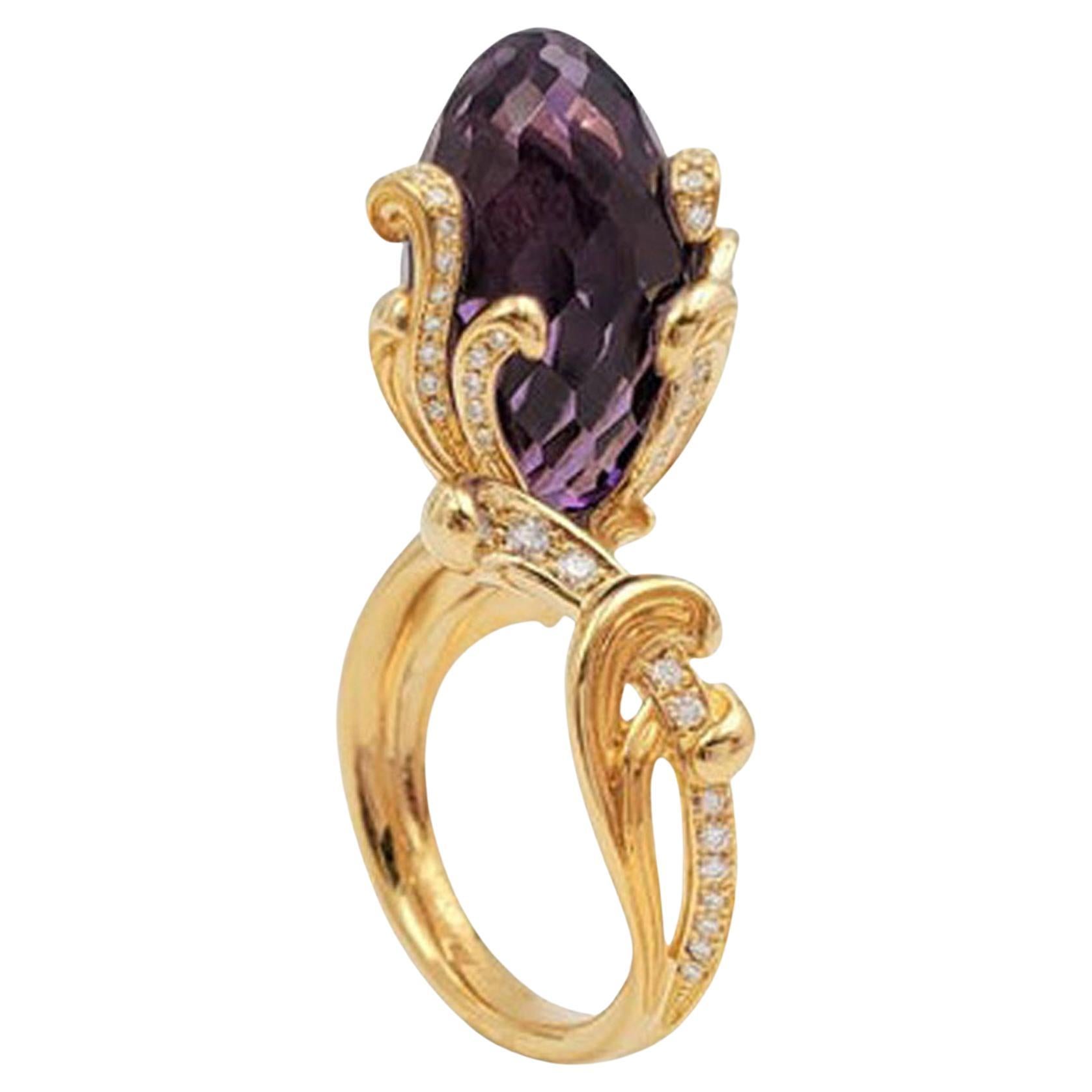 A stunning authentic avant-garde design by Carrera y Carrera from the Origin Collection. This unique and precious ring is crafted from 18k yellow gold featuring a vibrant ellipse-shape briolette cut amethyst gemstone set like a flower bud set inside