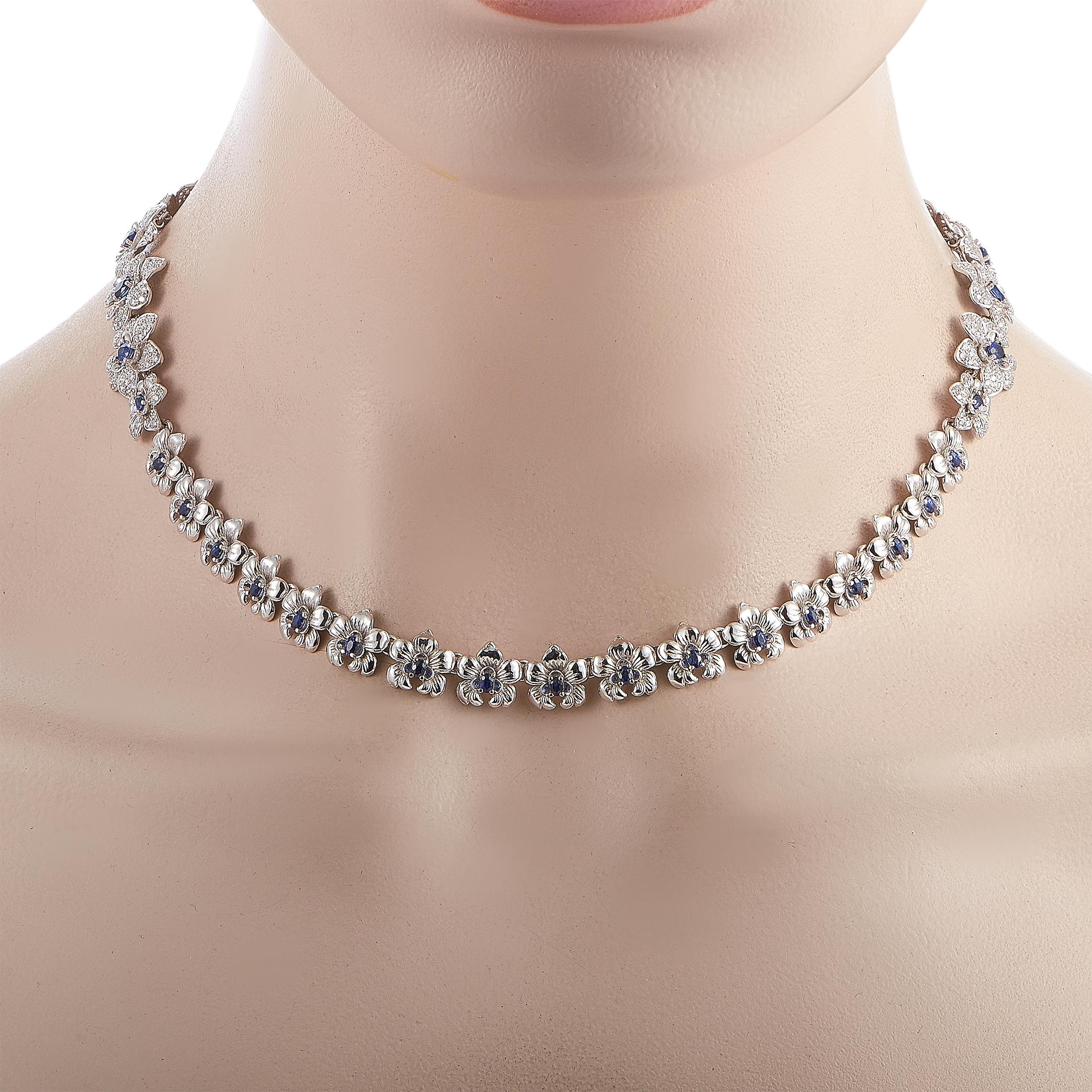 The Carrera y Carrera “Orquídeas” necklace is made of 18K white gold and embellished with diamonds and sapphires that total 6.95 and 3.42 carats respectively. The necklace weighs 53.2 grams and measures 17” in length.

Offered in brand new