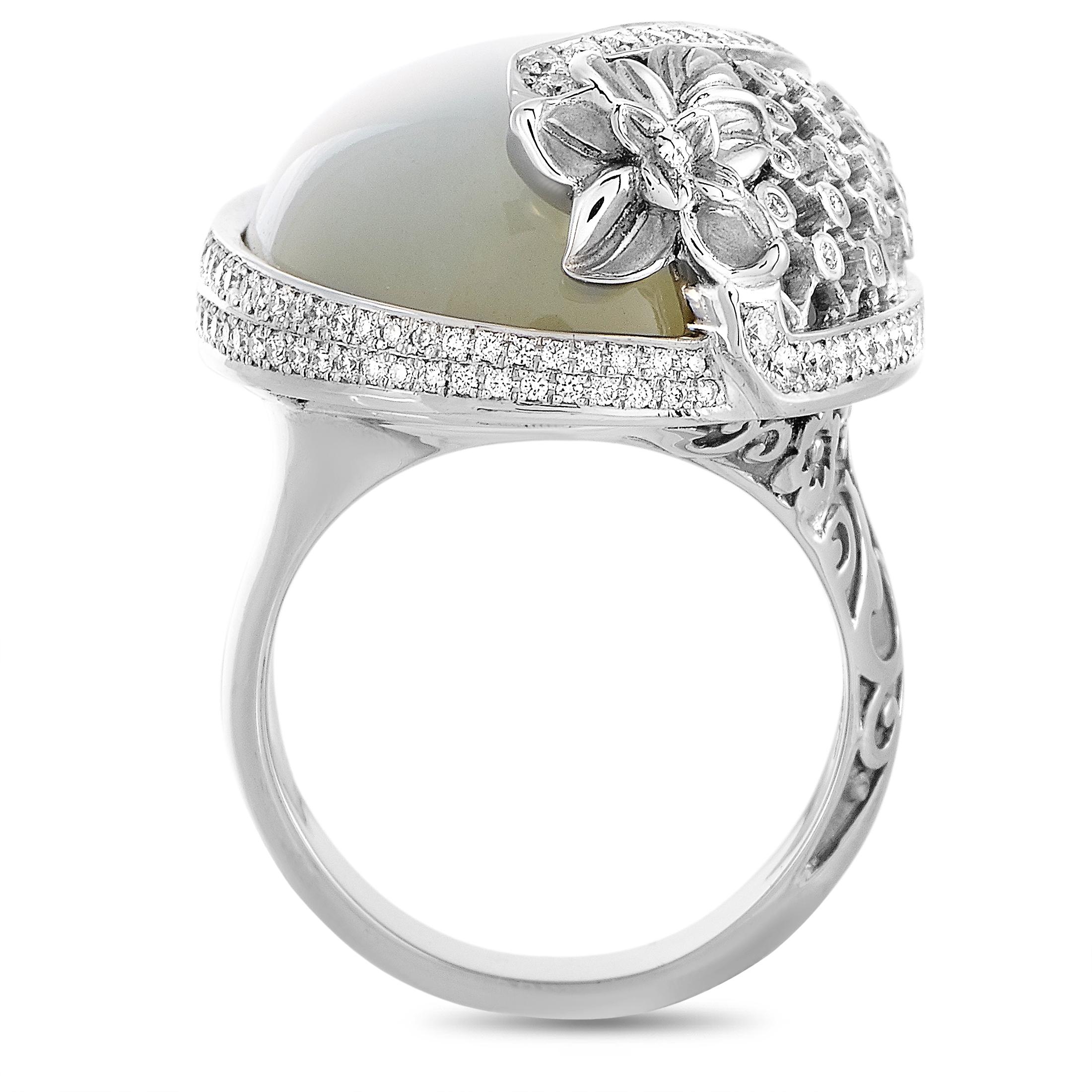 The Carrera y Carrera “Sierpes Maxi” ring is made of 18K white gold and weighs 28.3 grams, boasting band thickness of 5 mm and top height of 10 mm, while top dimensions measure 33 by 30 mm. The ring is embellished with a moonstone and a total of