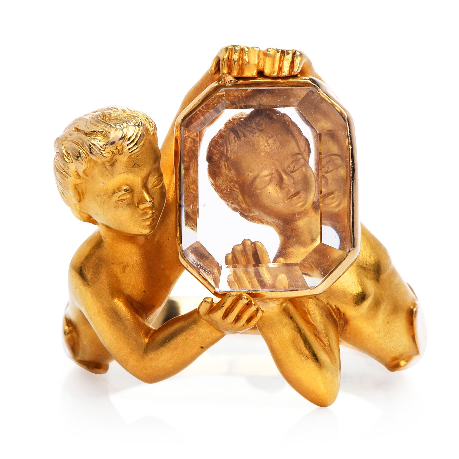 Exquisite highly collectible Carrara Y Carrera Narcissus-inspired ring.

Crafted in solid 18K yellow gold with a satin finish.

Presents two young figurines representing the greek mythology 