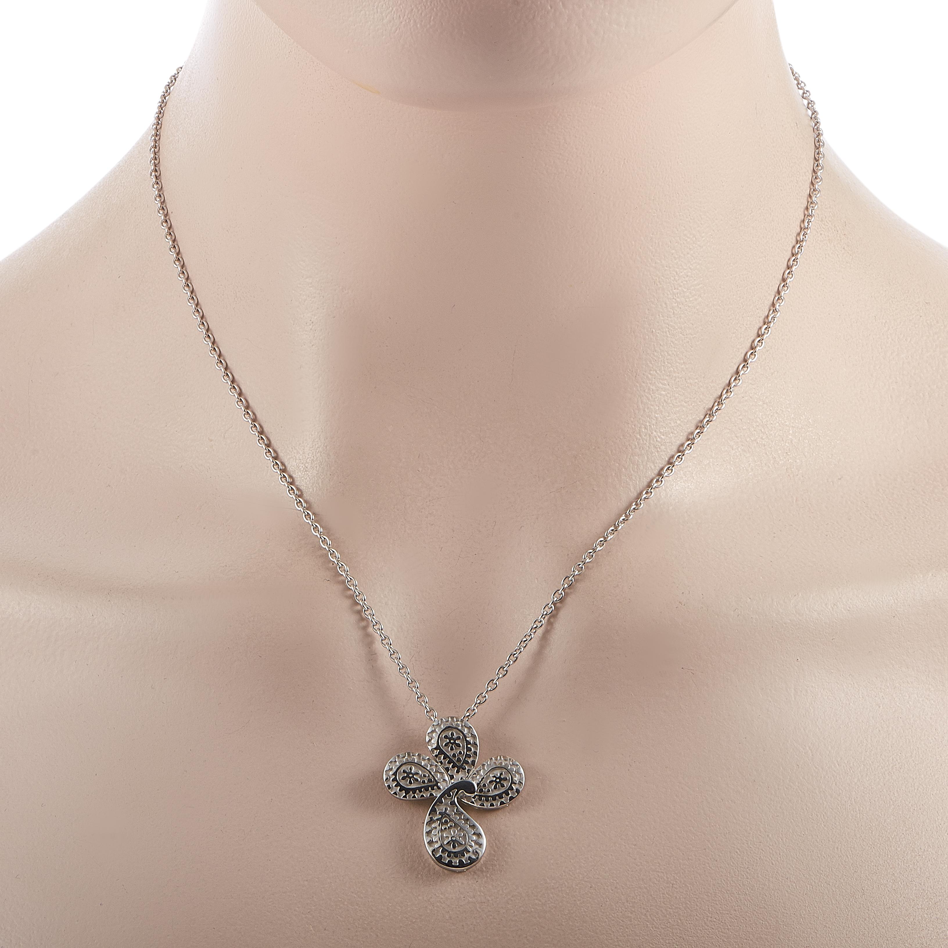 This Carrera y Carrera necklace is crafted from 18K white gold and weighs 12 grams. The necklace is presented with an 18” chain, onto which a 1” by 0.88” cross pendant is attached.

Offered in estate condition, this jewelry piece includes a gift box.