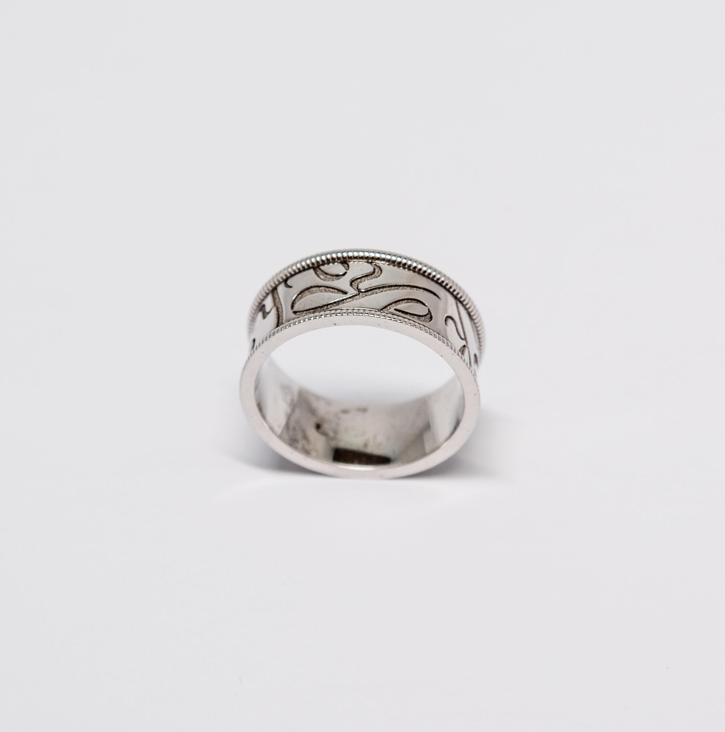 This ring is made of 18K White Gold. Band ring with engraved “Y” letters.

Size – 59 (9 US)