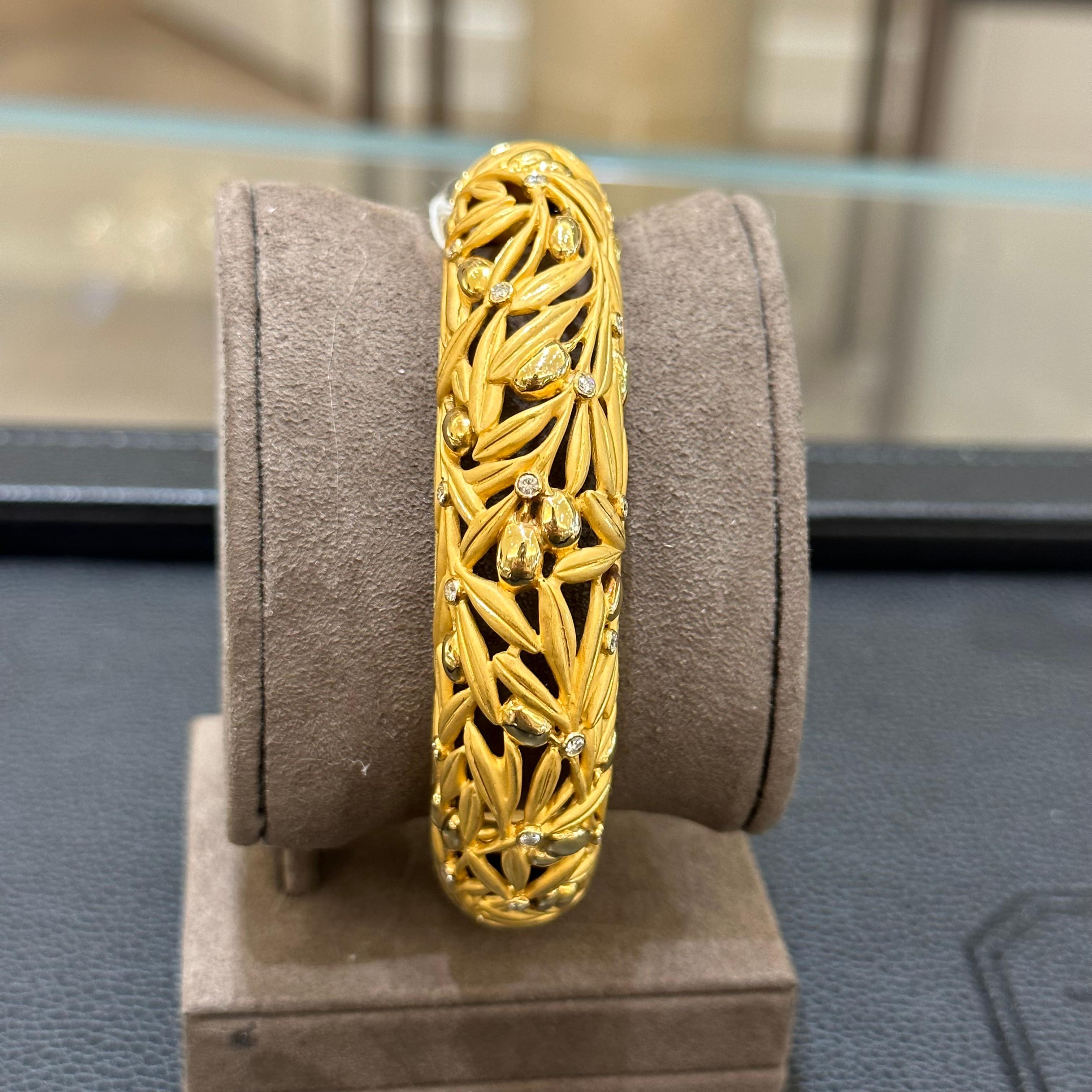 SIGNED 18K Yellow Gold and Diamond Accent Hinged Cuff Bangle with openwork Motif by Carrera Y Carrera.