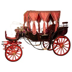 Carriage. Wood, metal, textile, 20th century.