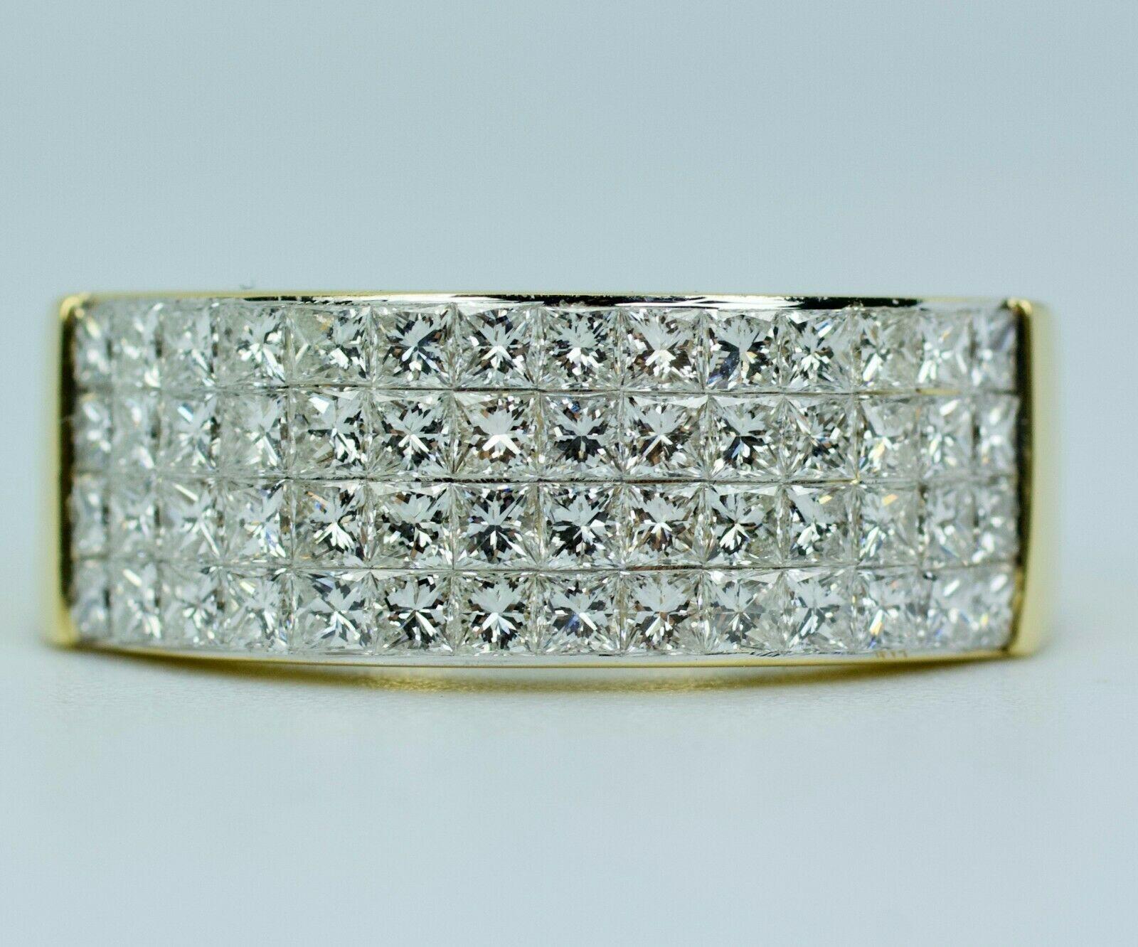 Carriere 18k Yellow Gold  Princess Cut Diamond Band 
Ring Size 9
8 Grams
Princess Cut Diamonds 2 Carats Total Weight
Color: F-G Clarity: Vs2-Si1
this is a beautiful princess cut  diamond band. The diamonds in this ring sparkle in any lighting. If