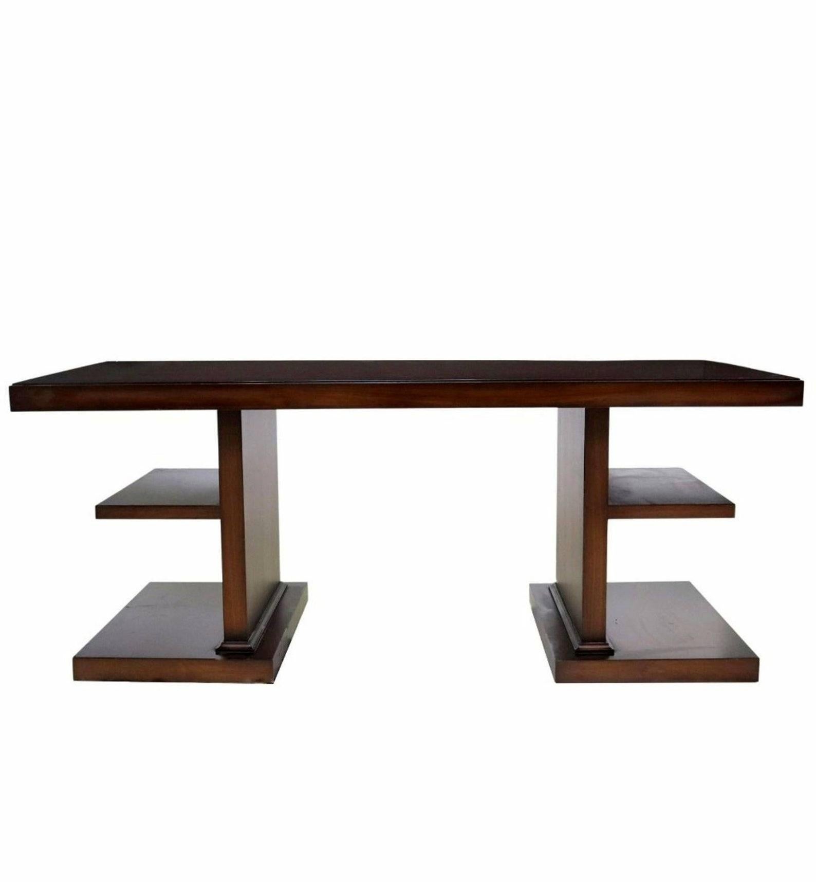 A high quality custom made walnut contemporary writing desk by luxury furniture maker Carrocel Interiors. 

Styled in timeless Art Deco Modern taste, made of richly figured walnut, having a rectangular top, over two open-shelf pedestal