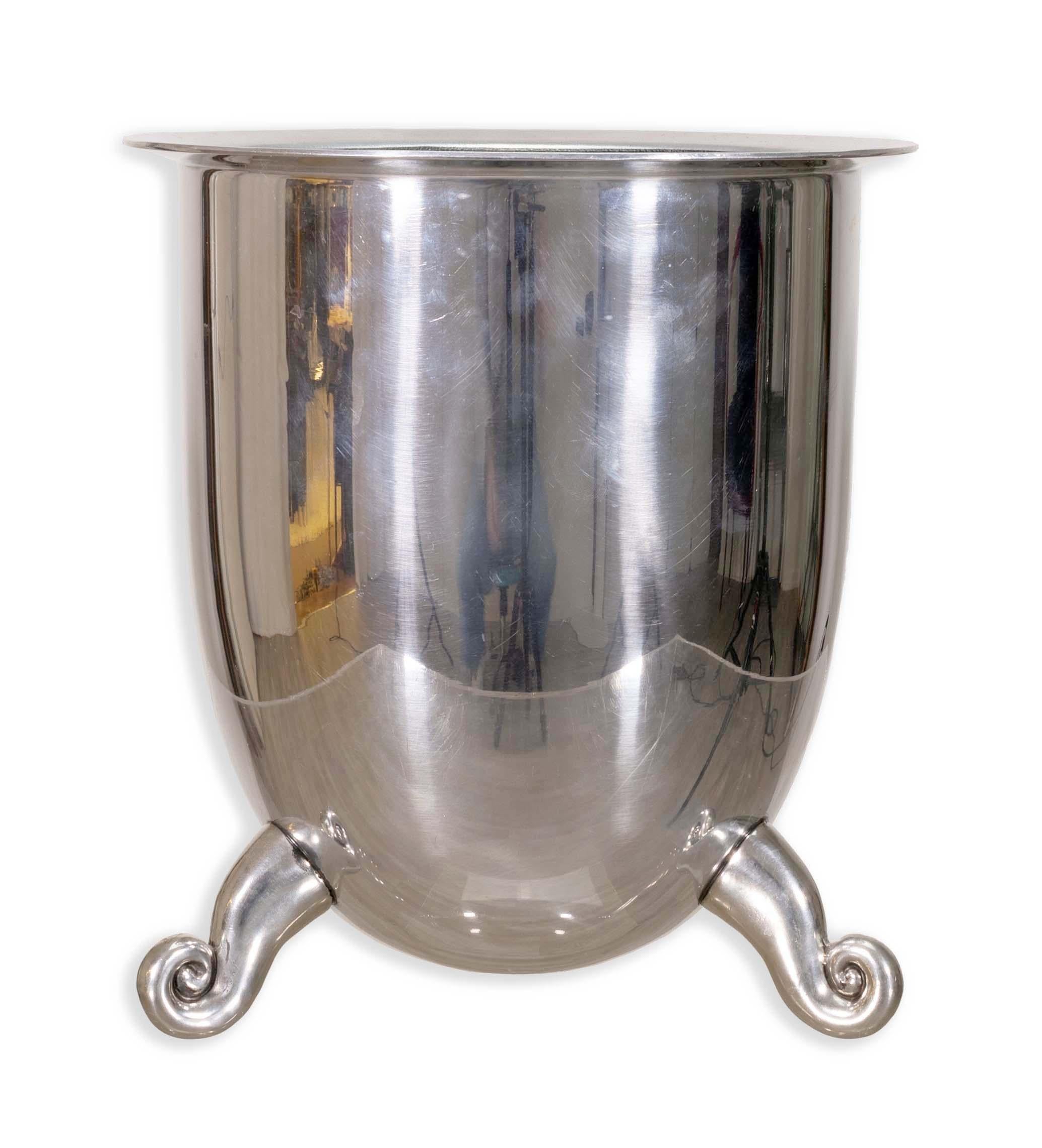 Elegant and functional, this Carrol Boyes Aluminum Ice Bucket/Champagne Cooler is a stunning addition to your barware collection. With its sleek aluminum finish and charming curled feet, it combines mid-century modern sophistication with playful
