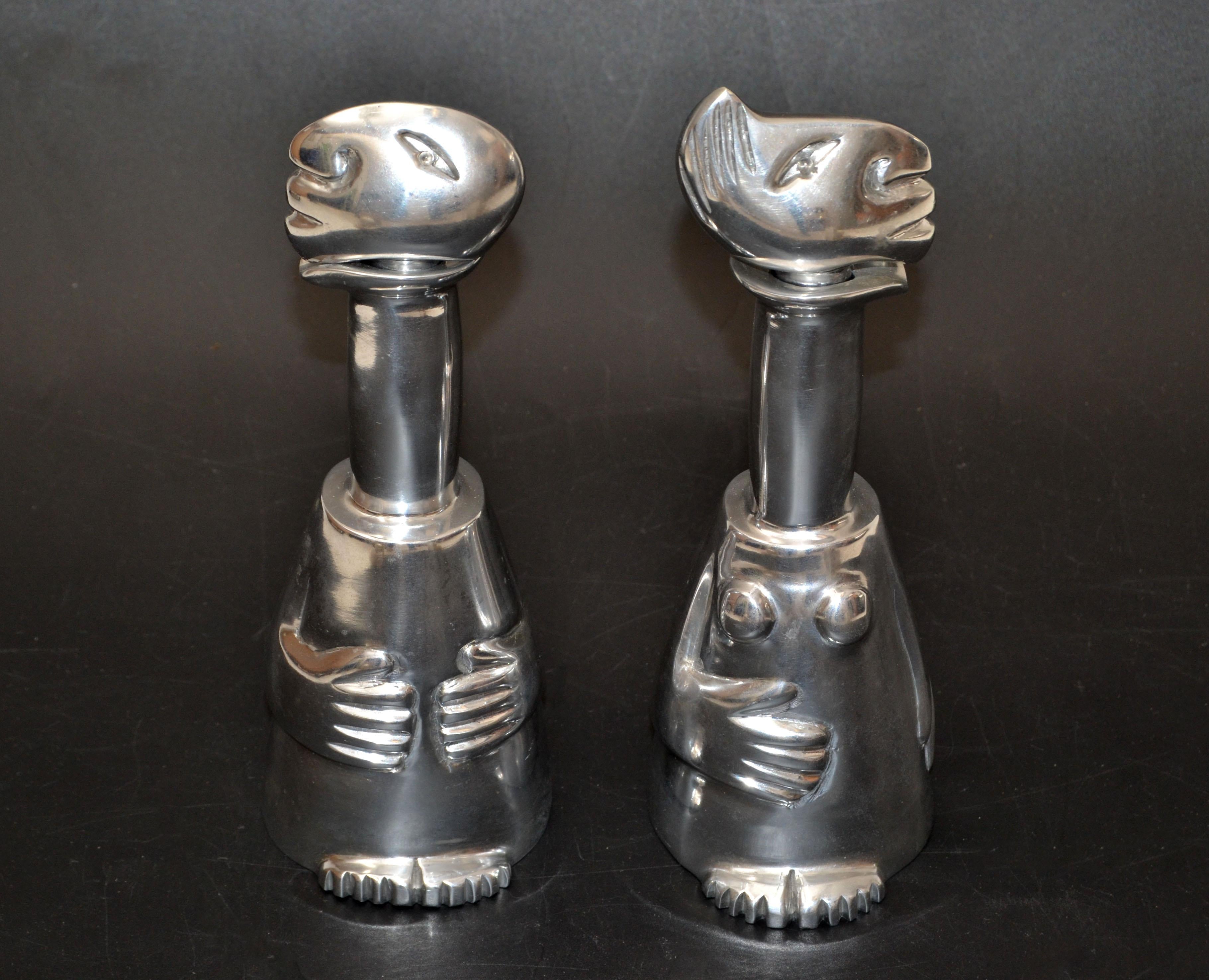 Carrol Boyes South African artist aluminum abstract man & woman Vessel, Bottle or Barware with Stopper.
Whimsical design that functions with a unique look! 
Marked at the Base.