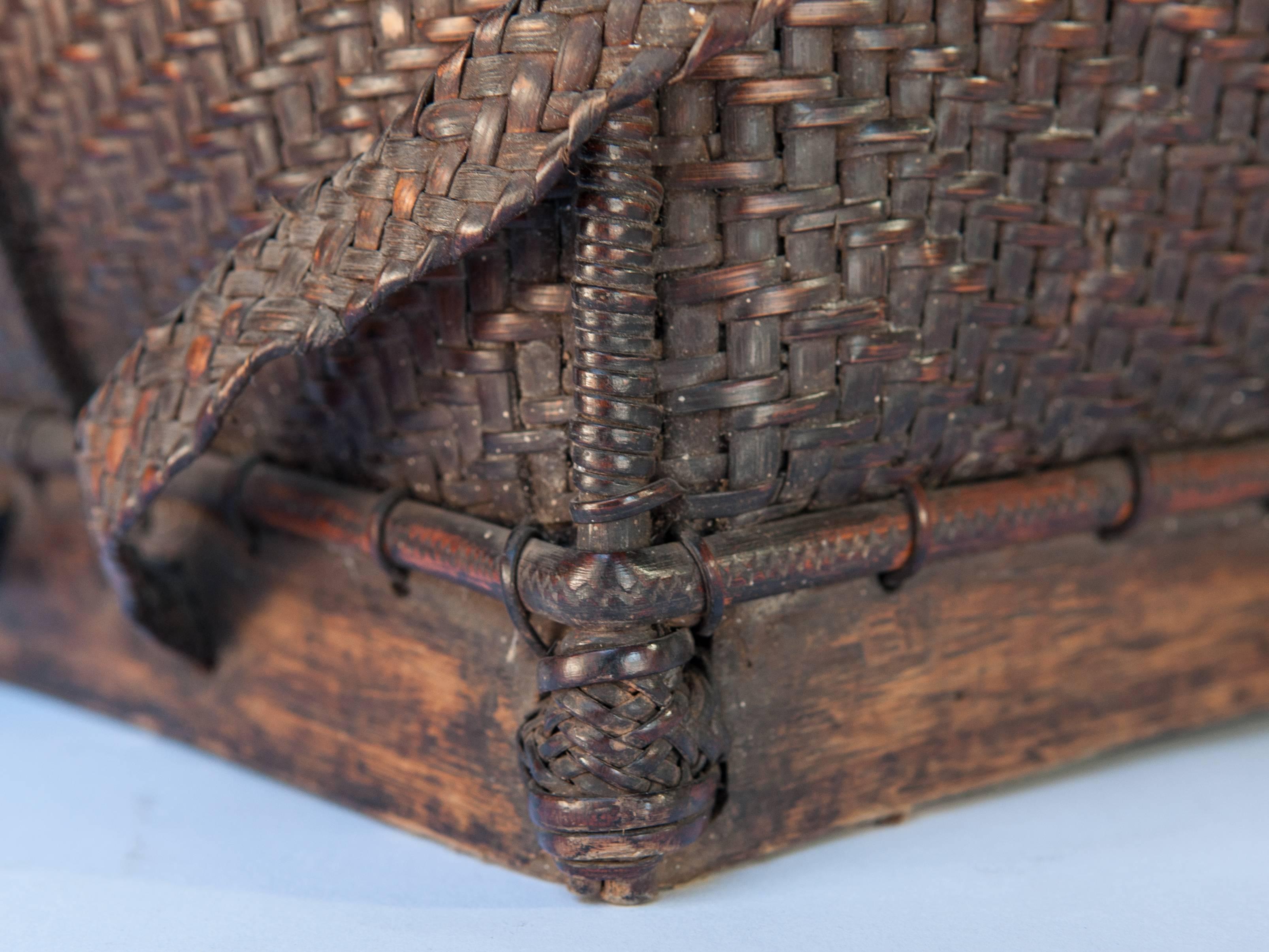 Hand-Crafted Carrying Basket from Laos, Mid-20th Century, Bamboo and Rattan with Wooden Base