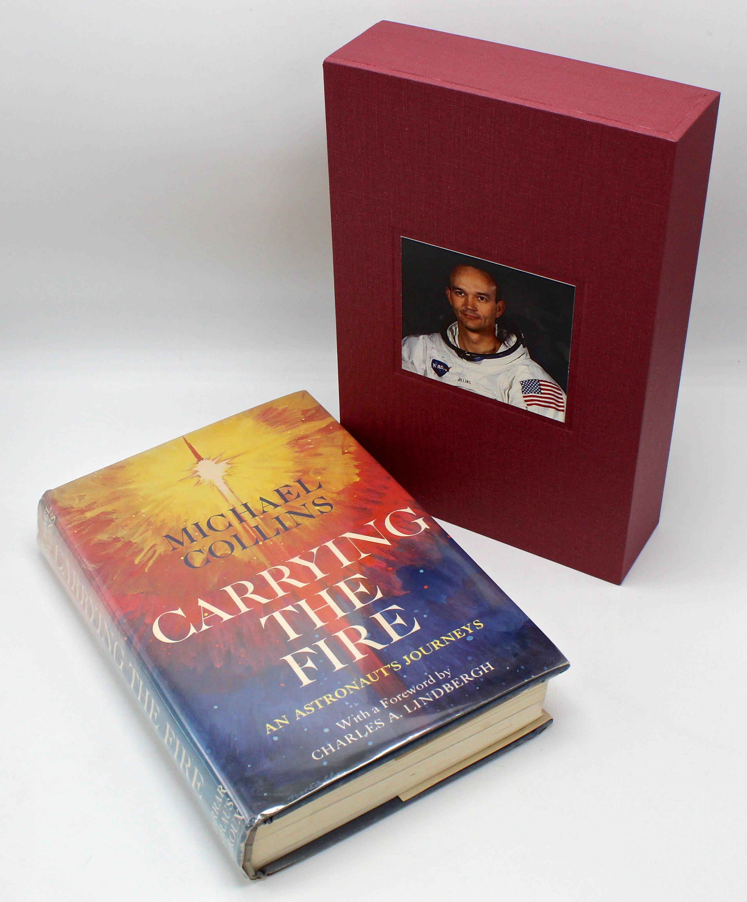 carrying the fire signed