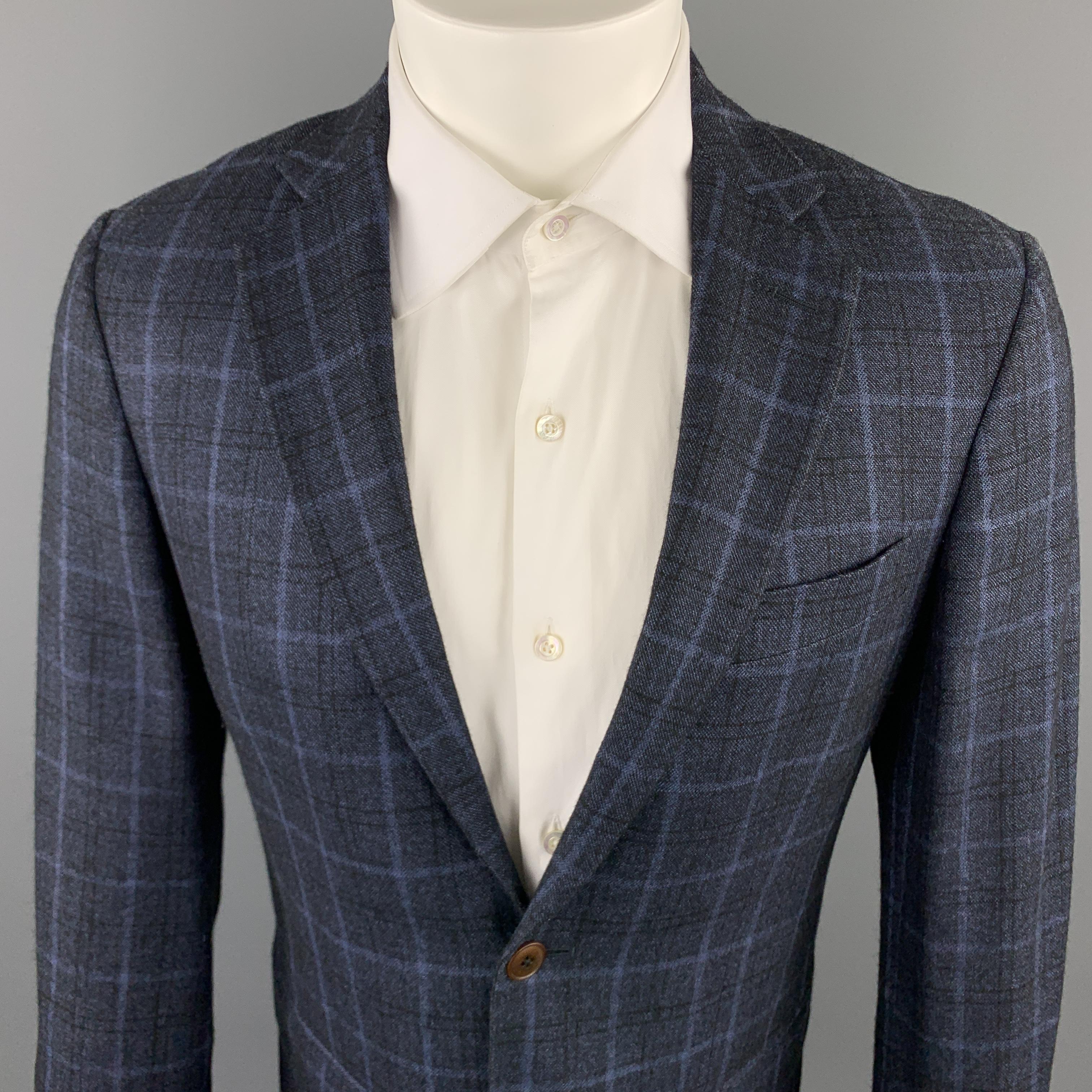 CARSON STREET sport coat comes in a plaid wool blend material, featuring a notch lapel, two buttons at closure, buttoned cuffs, and a double vent at back. Made in Italy. 

Excellent Pre-Owned Condition.
Marked: 48R

Measurements:

Shoulder: 17 in.