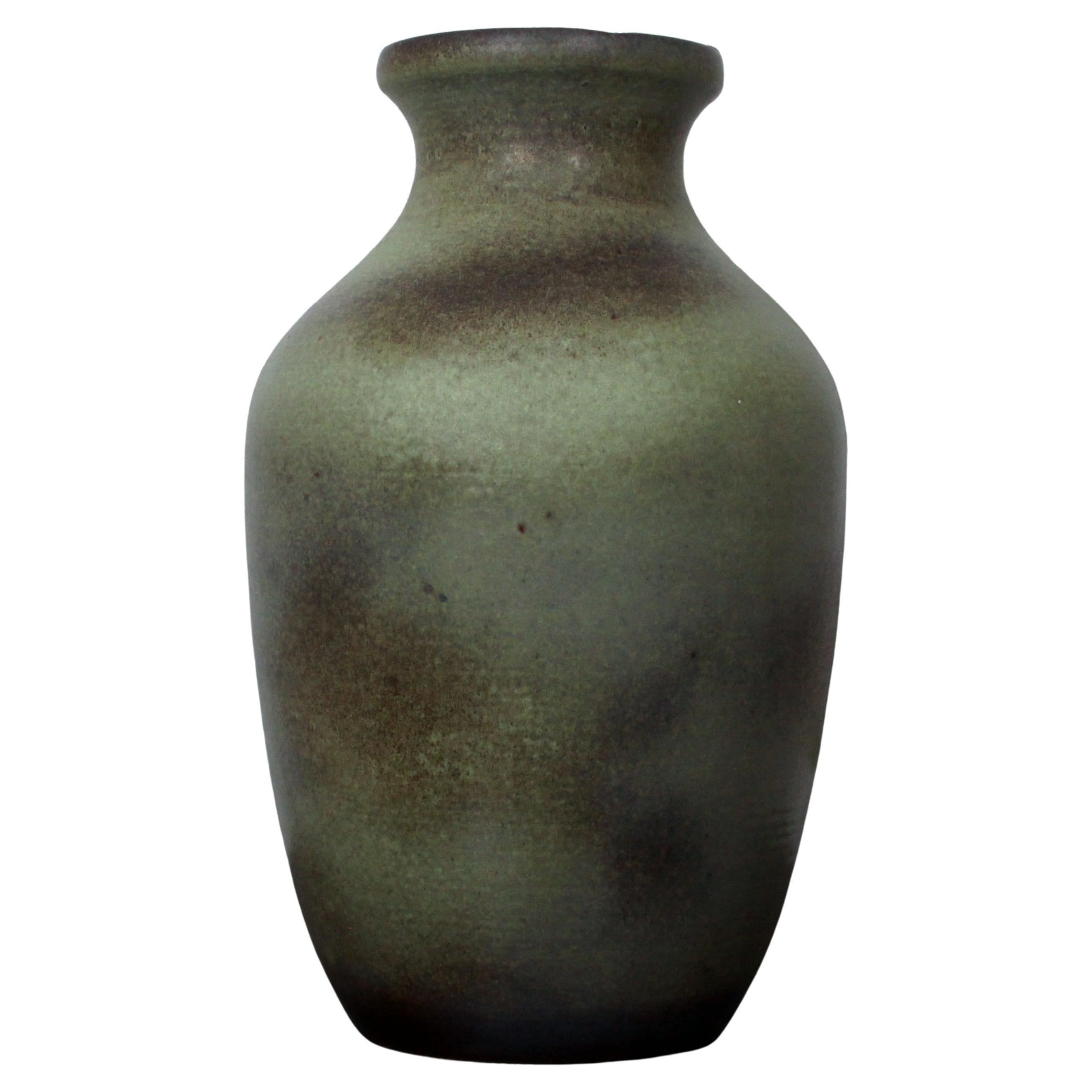 HUGE FLOOR VASE
cloudy green glaze


Manufacturer 	CARSTENS TÖNNIESHOF
Design Period 	1968 to 1978
Production Period 	1968 to 1978
Country of Manufacture 	Germany
 H / height: 52cm ~  Gew. / weight: 5350grs (!)
DM  / diameter max: 30cm ~ DM oben /