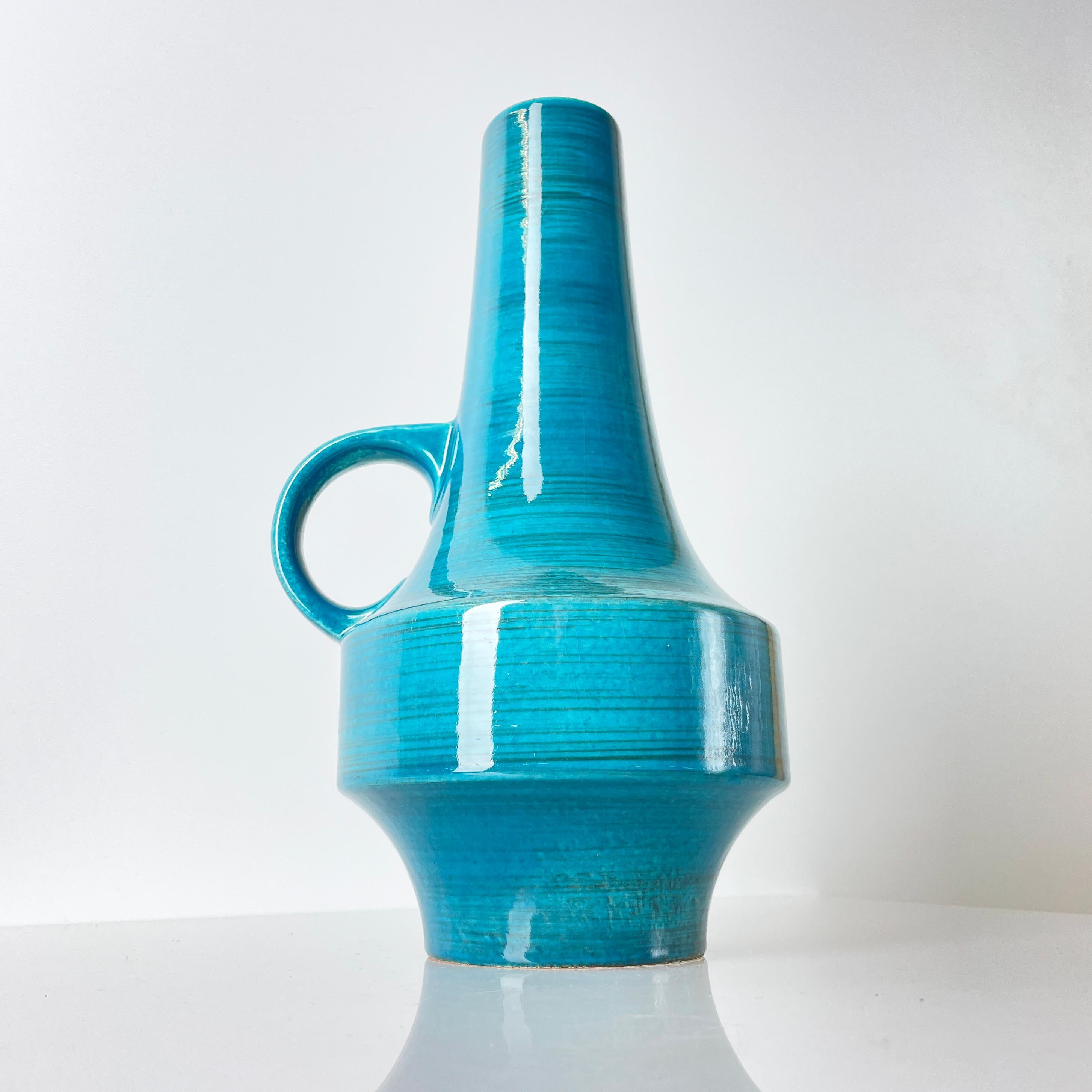 Late 60's to mid-1970's Carstens West German Ceramic Vase with vibrant turquoise glaze. Numbered on base: W. Germany 1525 - 28
Produced: Carstens Keramik, W. Germany (1960’s)
Measurements: 28 cm
Condition: Excellent