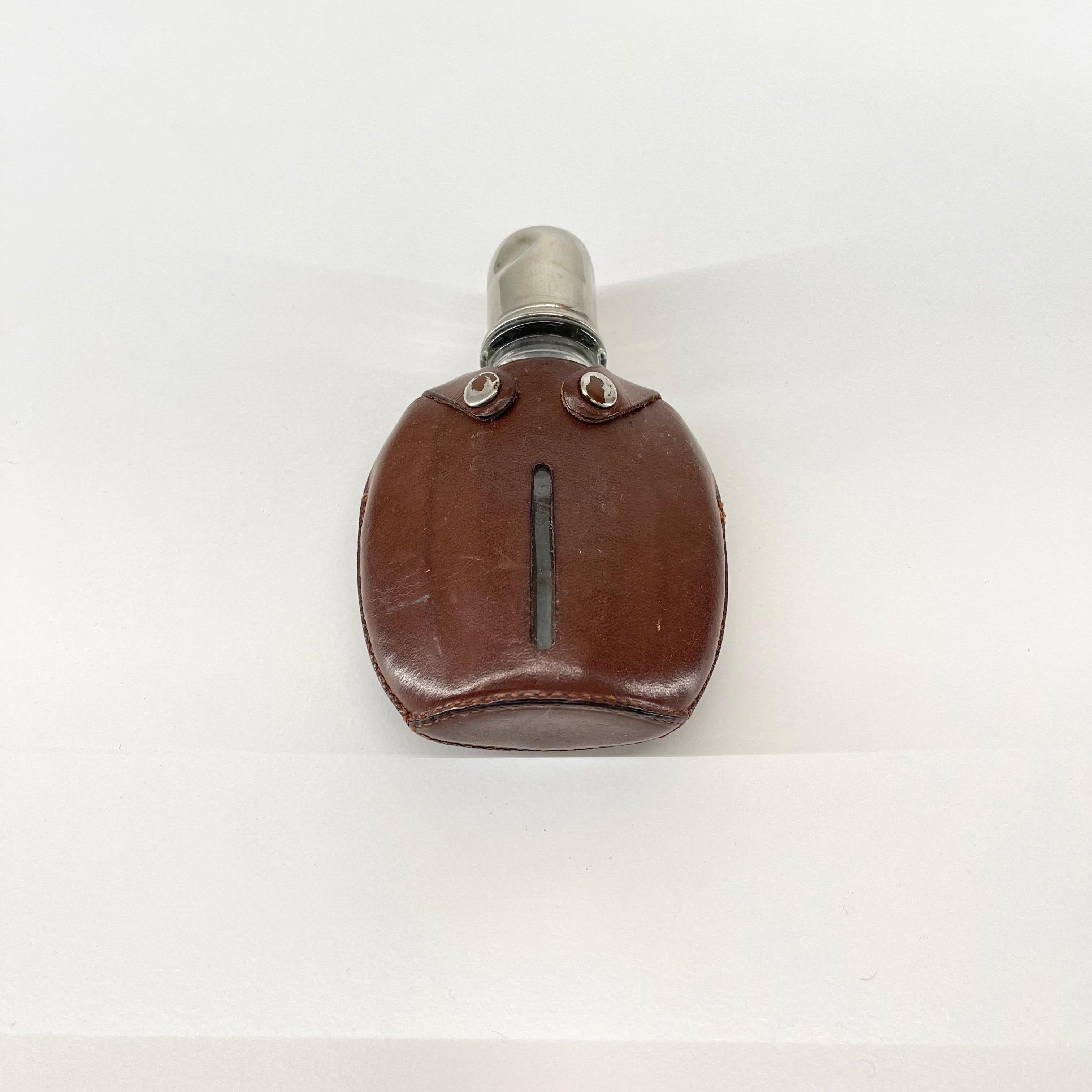 Cart Auböck II. Leather wrapped gentleman flask, Austria, 1950s.