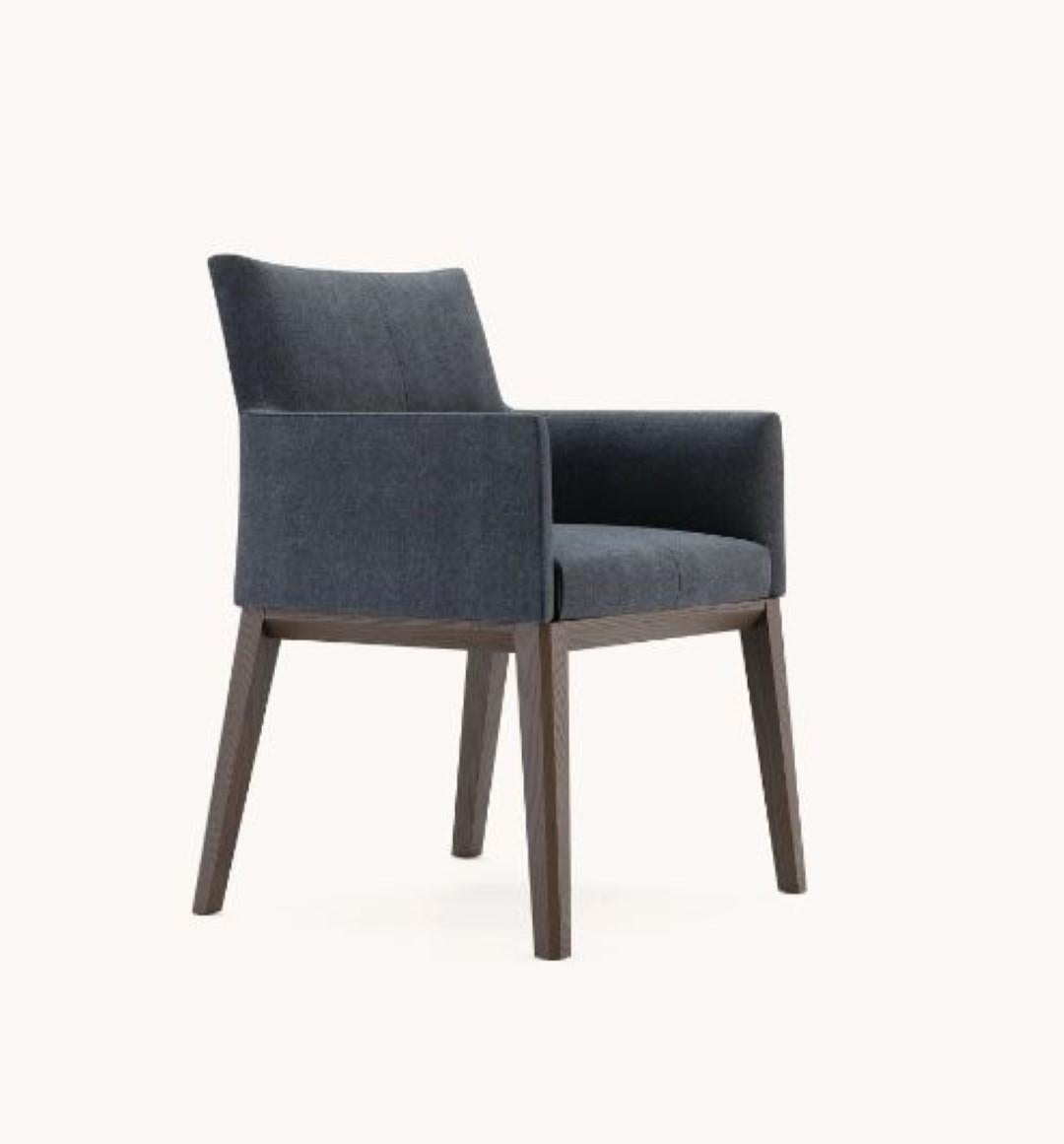 Carter chair by Domkapa
Materials: Fabric, Fumé Stained Ash.
Dimensions: W 62 x D 68 x H 86 cm.
Also available in different materials. 

Carter chair is the perfect combination between traditional and contemporary lines, thickness, and