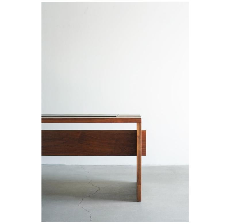 This desk is custom made in Los Angeles. The solid walnut boards are cut to size and joined. The leather is cut to size and adhered to the wood top.

WALNUT + LEATHER
HARDWAX OIL FINISH
CUSTOMIZE THIS PIECE

For all furniture, protection from heat