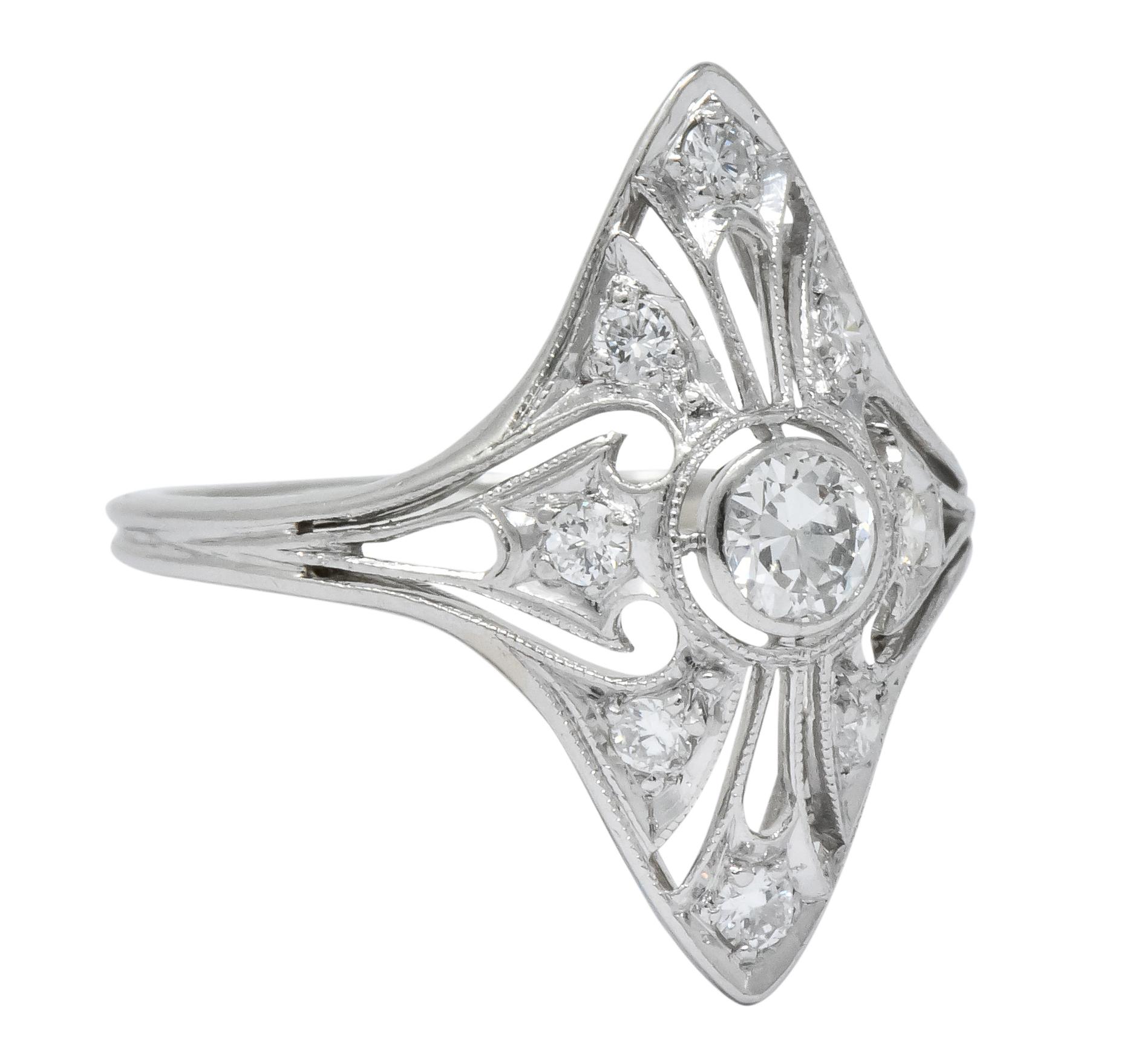 Navette form centering an old European cut diamond weighing approximately 0.25 carat, bezel set with a pierced surround

Accented with old European cut diamonds, weighing approximately 0.25 carat total

All diamonds are GHI color and VS to SI