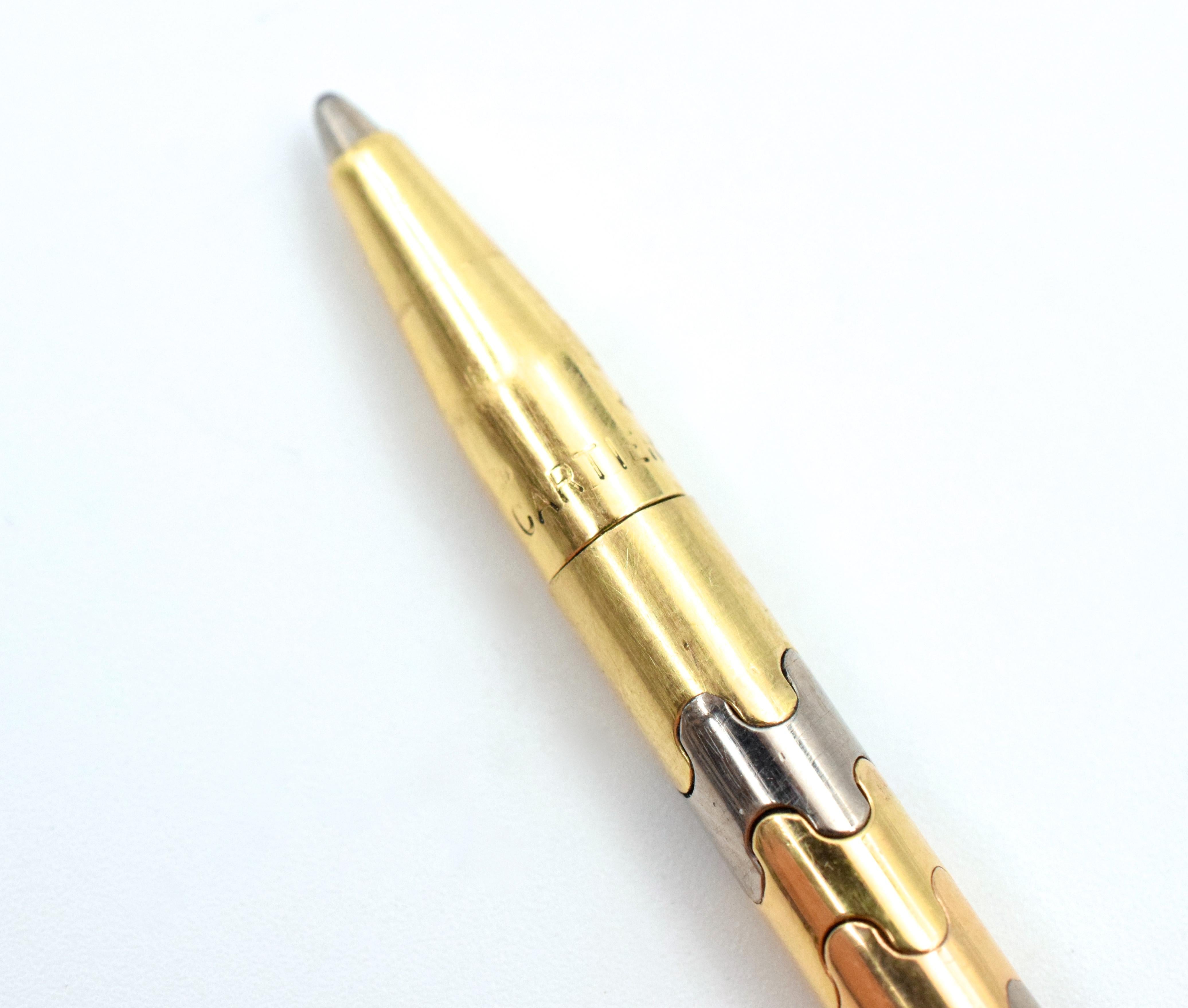 Unusual  pen - pendant by Cartier
Circa 1960 - 1970
 Made in 18k gold and steel.
 Weight 11.50g.
