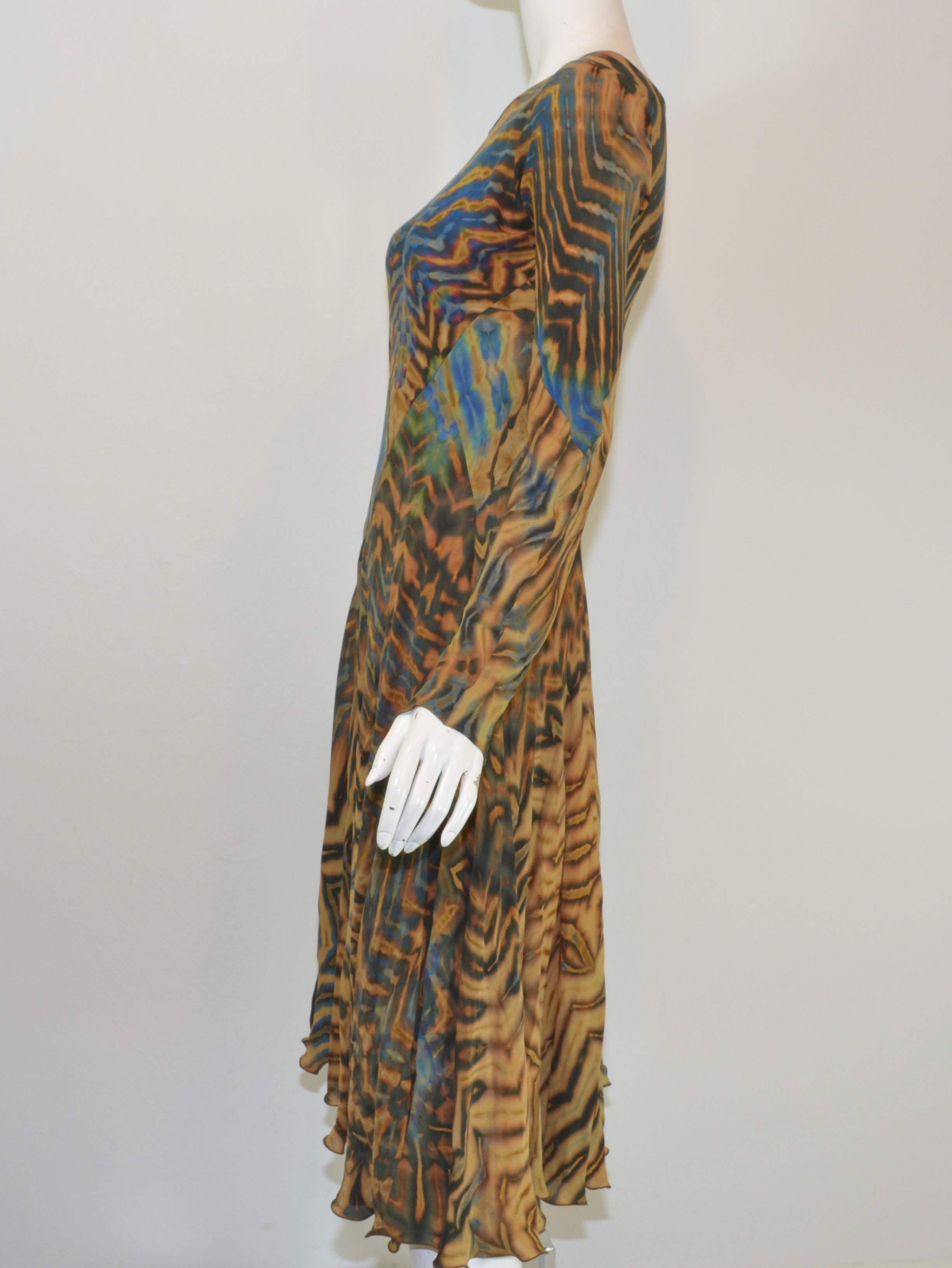 Carter Shibori Art-To-Wear Tye-Dye Bias Dress -- Featured in a color combination of blues and browns on beautiful silk chiffon and with a bias design. 

About Carter Smith: 
-For over 49 years, Carter Smith has been creating shibori fabrics that