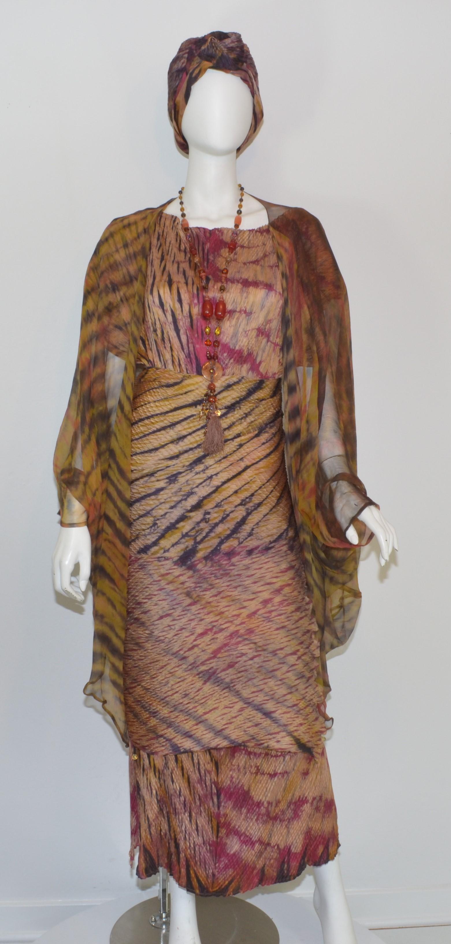 Shibori Maxi Dress Ensemble from the legendary San Francisco Art to Wear Mecca, Obiko. Ensemble includes 4 pieces. : turban style head piece, with Head Piece, Necklace, dress, chiffon duster vest. Fabric is hand dyed silk in the shibori tradition