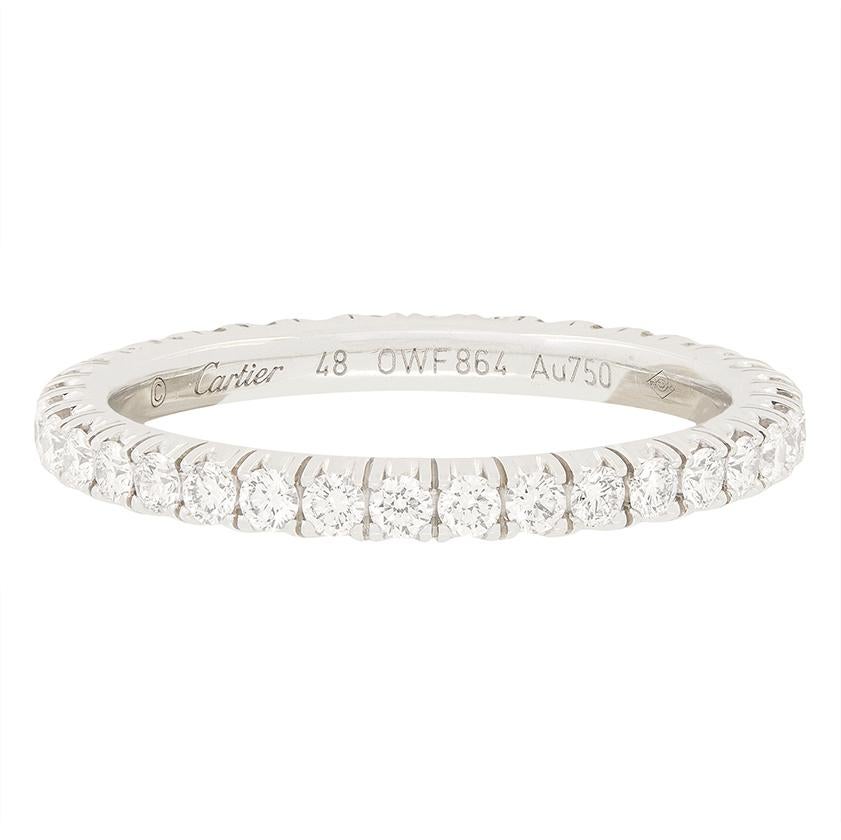 This timeless full eternity wedding band comes from the designer Cartier from their ‘Étincelle De Cartier‘ collection. This band is crafted in 18 carat white gold and is micro set with a total of 0.47 carat of round brilliant cut diamonds. They are