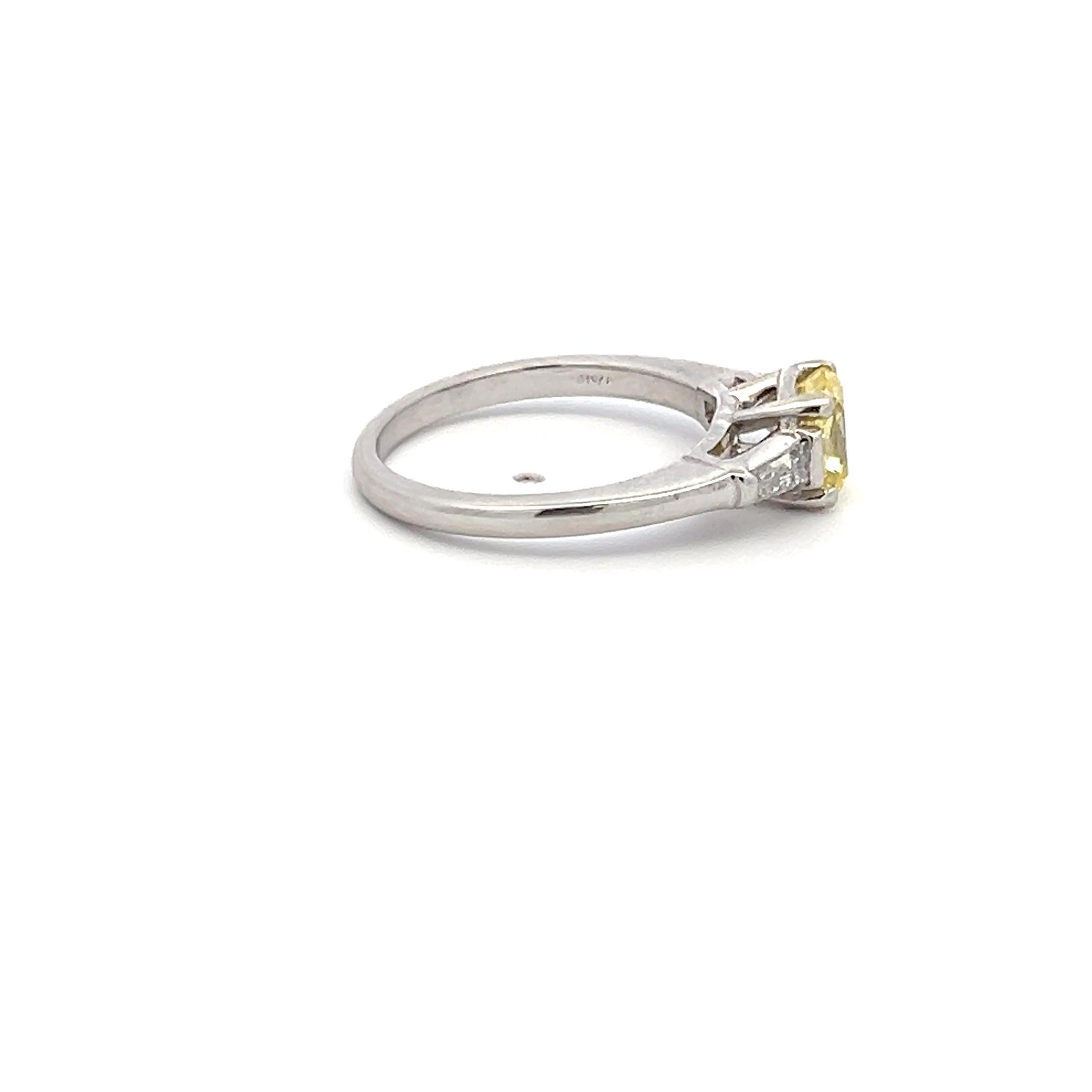 Designer:
CARTIER
Title:
 Cartier 0.91 Carat Fancy Vivid Yellow VS2 Diamond Platinum Engagement Ring
Style:
Engagement
Gemstone 1:
0.91 Carat Diamond
Number of Stones:
1
Color:
FVY
Clarity:
VS2
Shape:
Radiant Cut
GIA:
DIAM RA FVY VS2 (GIA)