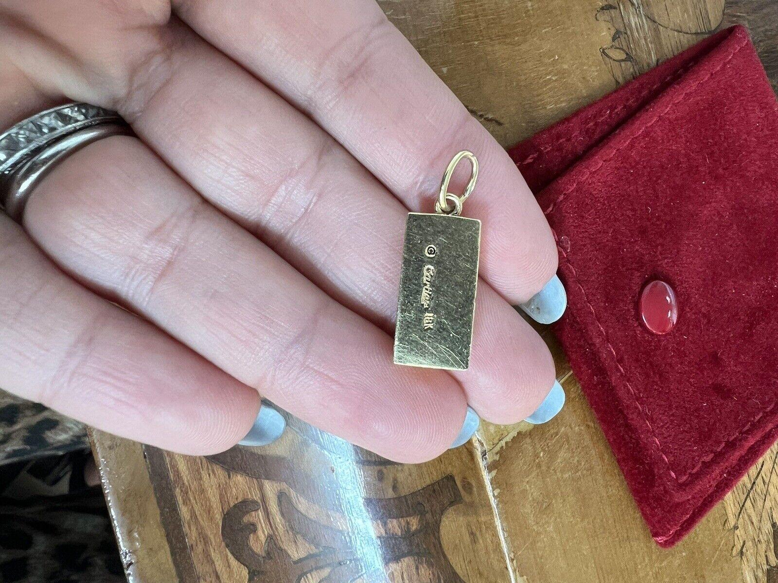 Cartier 18k Yellow Gold 1/4 Oz Ingot Charm Pendant Vintage Circa 1970s


Here is your chance to purchase a beautiful and highly collectible designer charm pendant.  Truly a great piece at a great price! 

Details:
Size : 1/4 oz ingot charm
9.7