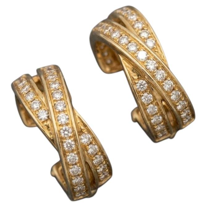 Cartier Trinity-Creolen aus 18-karätigem Gelbgold mit einem 1-Karat-Diamanten