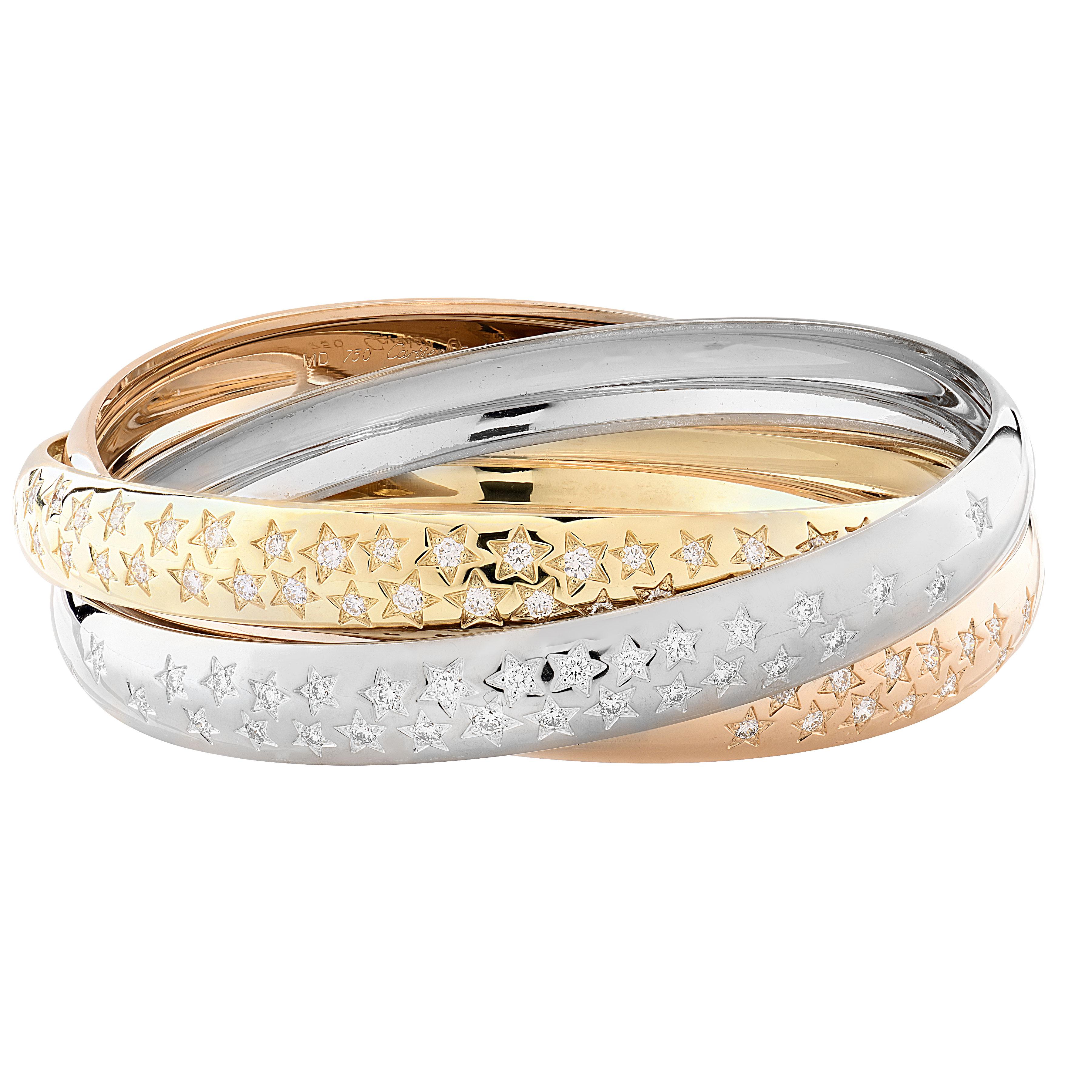 A rare and exceptional masterpiece from the legendary House of Cartier, this limited-edition Trinity bangle was created in celebration of a century of the Maison’s artistry and innovation. Exquisitely fashioned in 18k white, yellow, and rose gold,